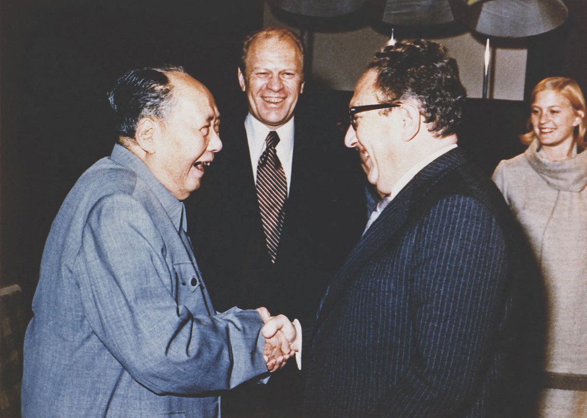 Henry Kissinger pictured with Mao Zedong in 1975 as president Gerald Ford looks on. Photo: Reuters
