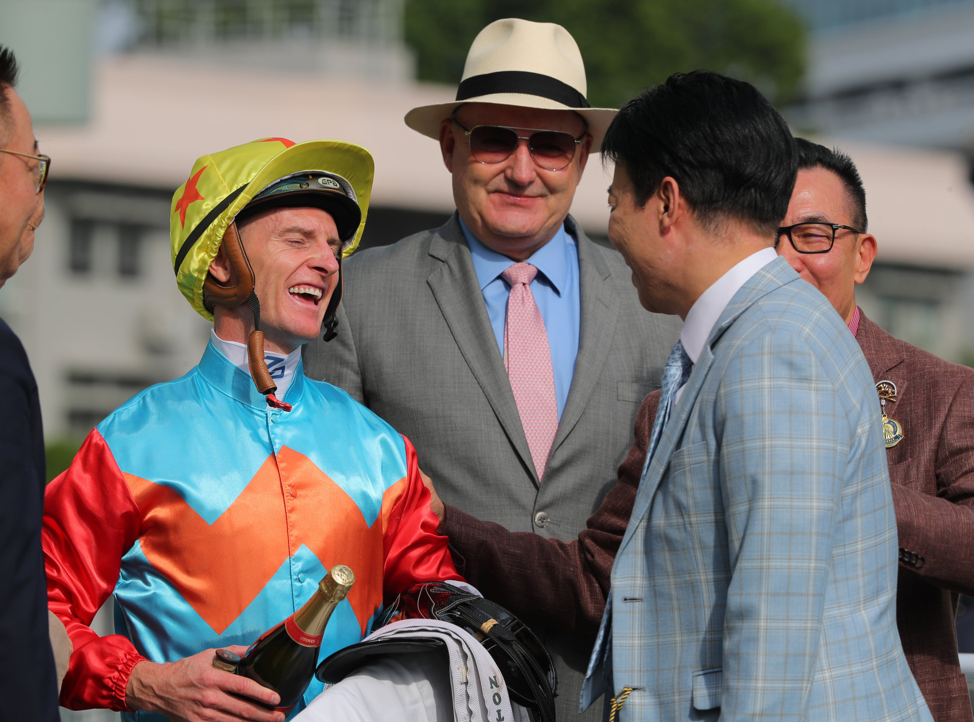 Jockey Zac Purton, trainer David Hayes and connections celebrate Ka Ying Rising’s debut success.