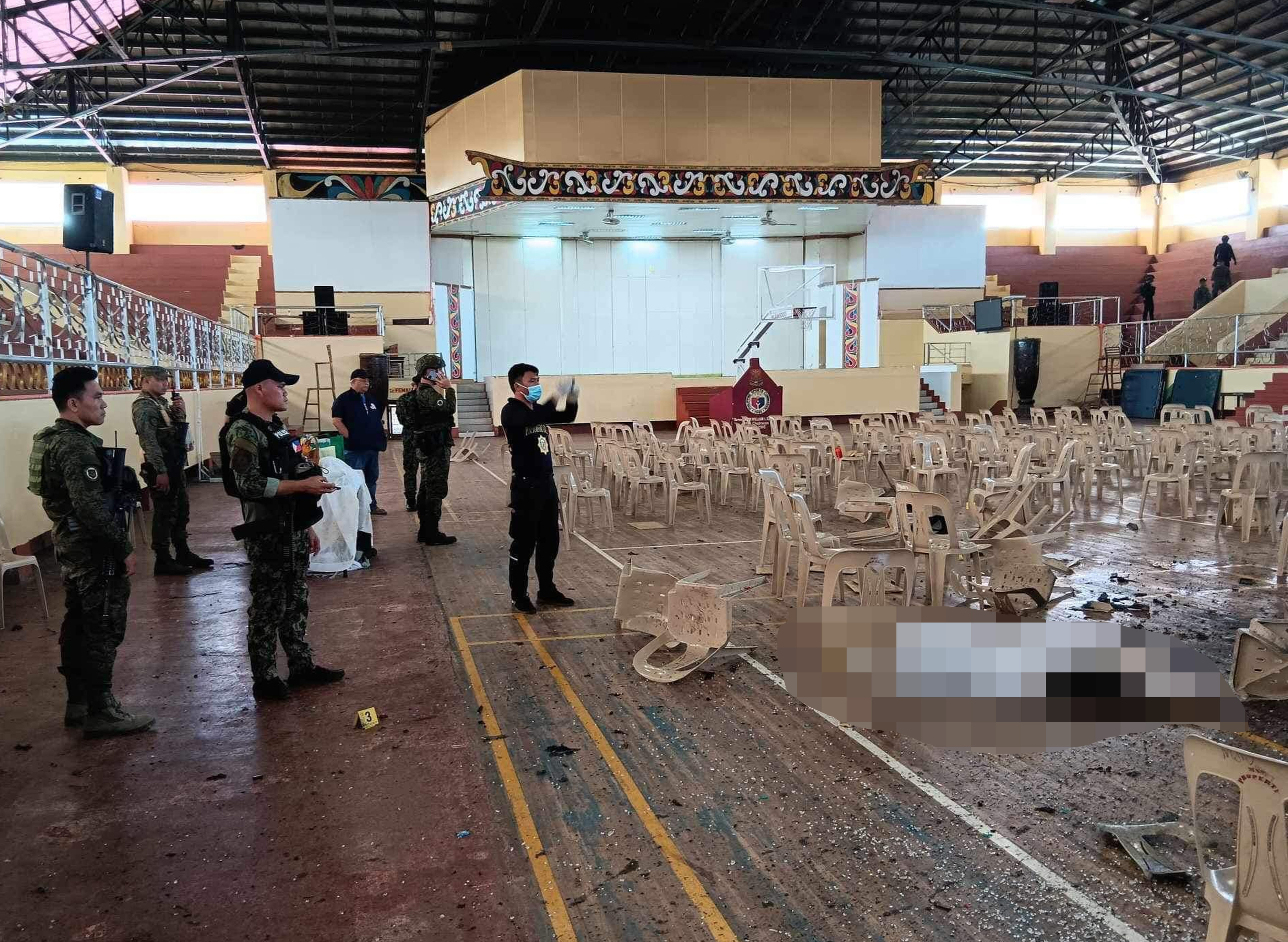 === PHOTO CAPTURED FROM FACEBOOK ===Lanao del Sur Governor Mamintal Adiong, Jr. speaks with authorities as he checks the Dimaporo Gymnasium of Mindanao State University in Marawi City where an explosion took place during a religious Mass morning on December 3, 2023 Facebook/ @Provincial Government of Lanao Del Sur