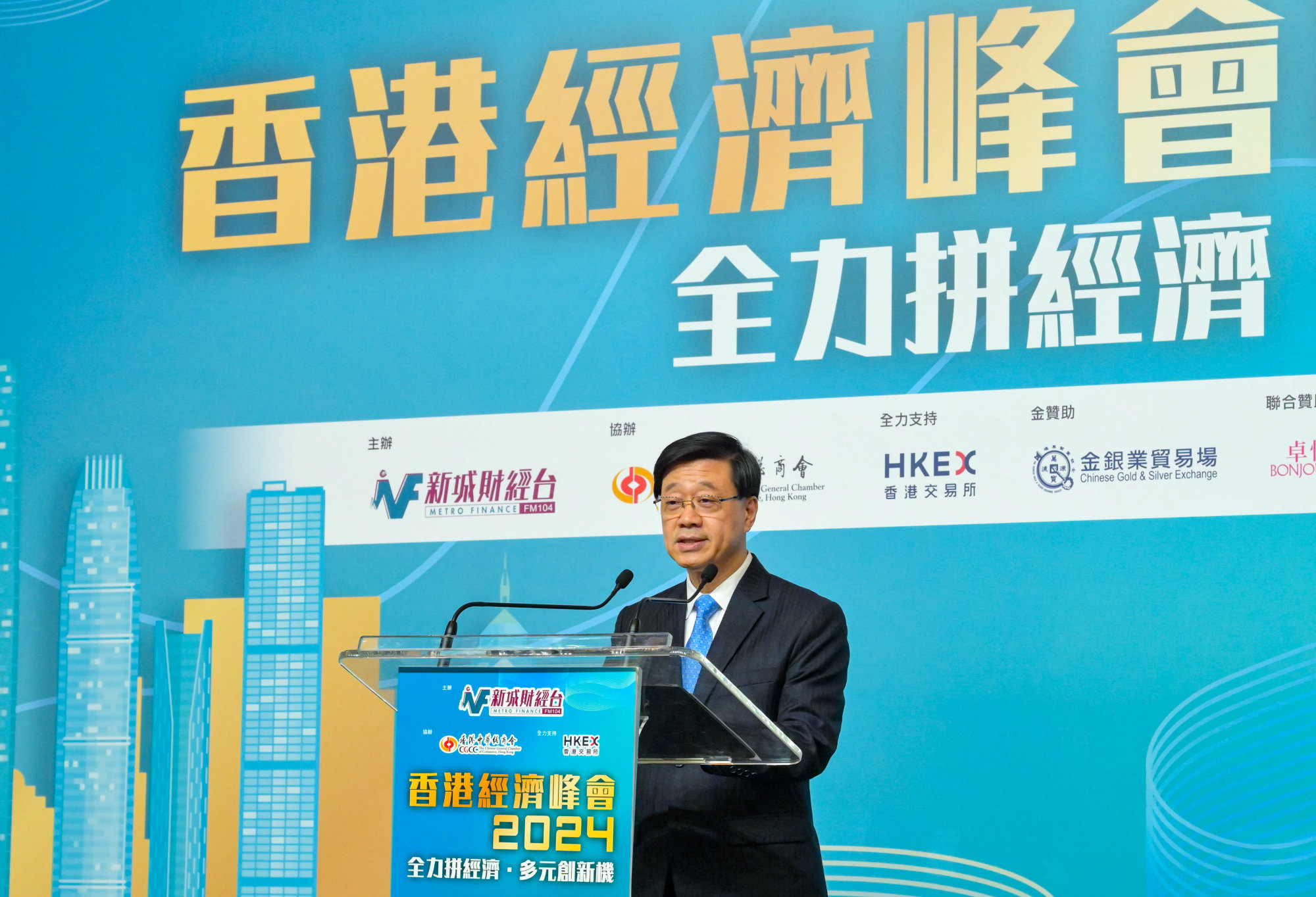 Chief Executive John Lee has called on businesses to come up with creative ways to keep consumers spending. Photo: Handout