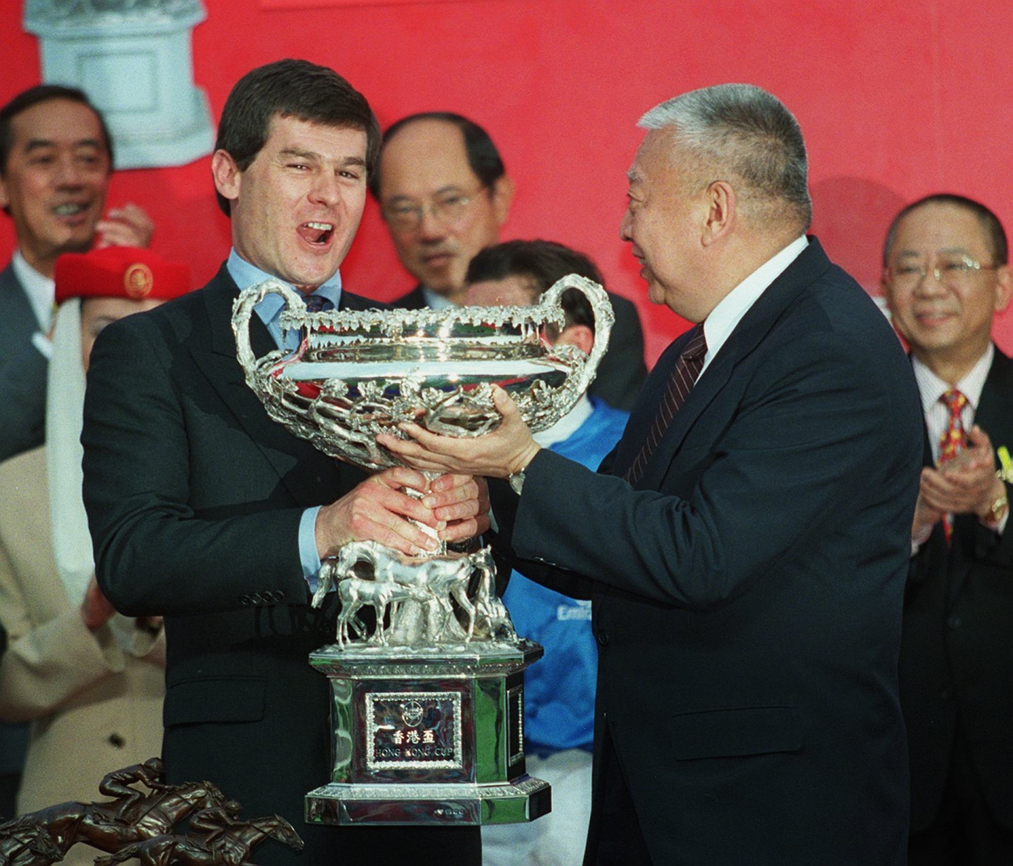 Simon Crisford (left) receives the 2000 Hong Kong Cup following Fantastic Light’s win at Sha Tin. Photo: K. Y. Cheng