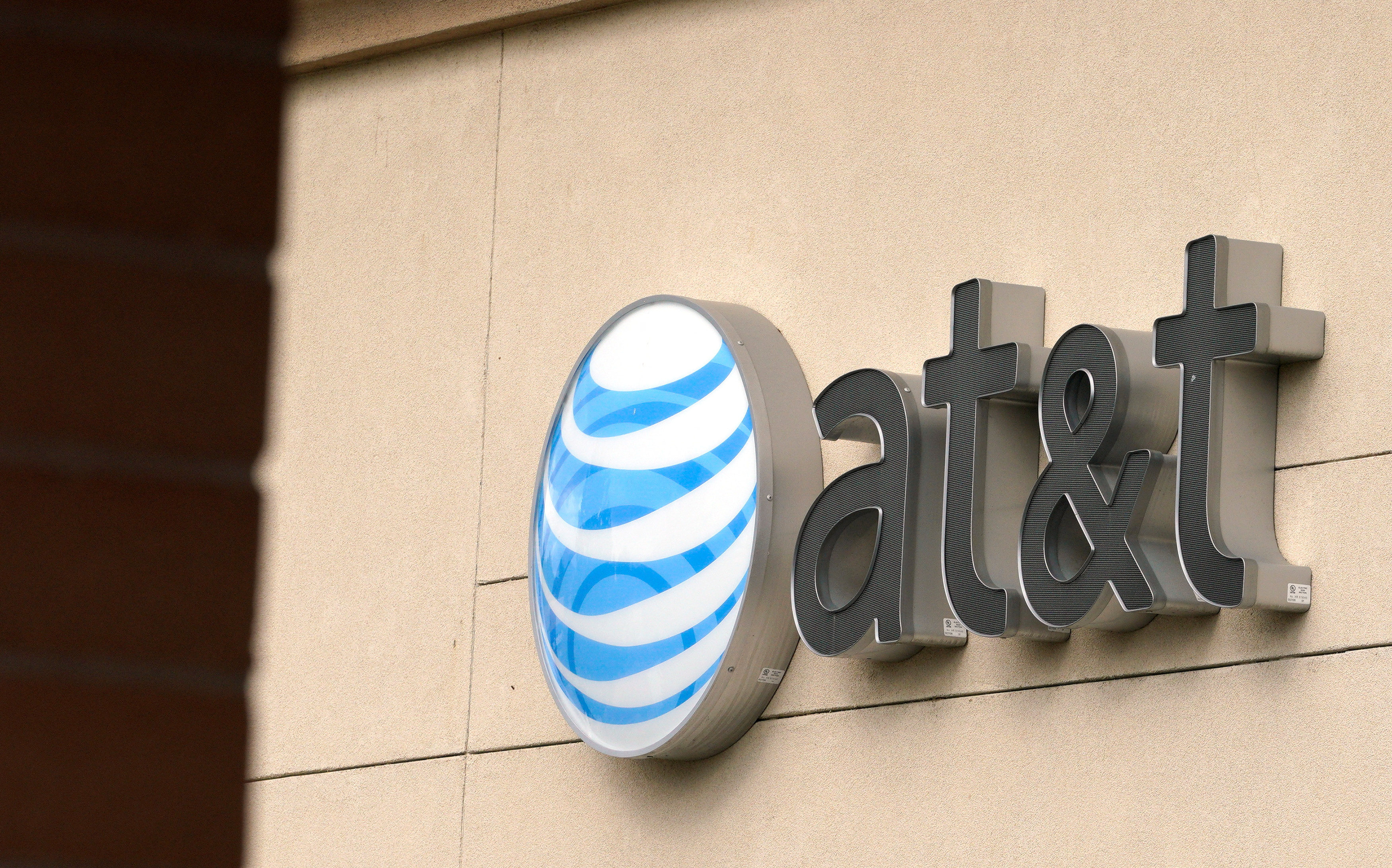 The AT&T logo is seen on a store in Golden, Colorado, in the western United States. Photo: Reuters