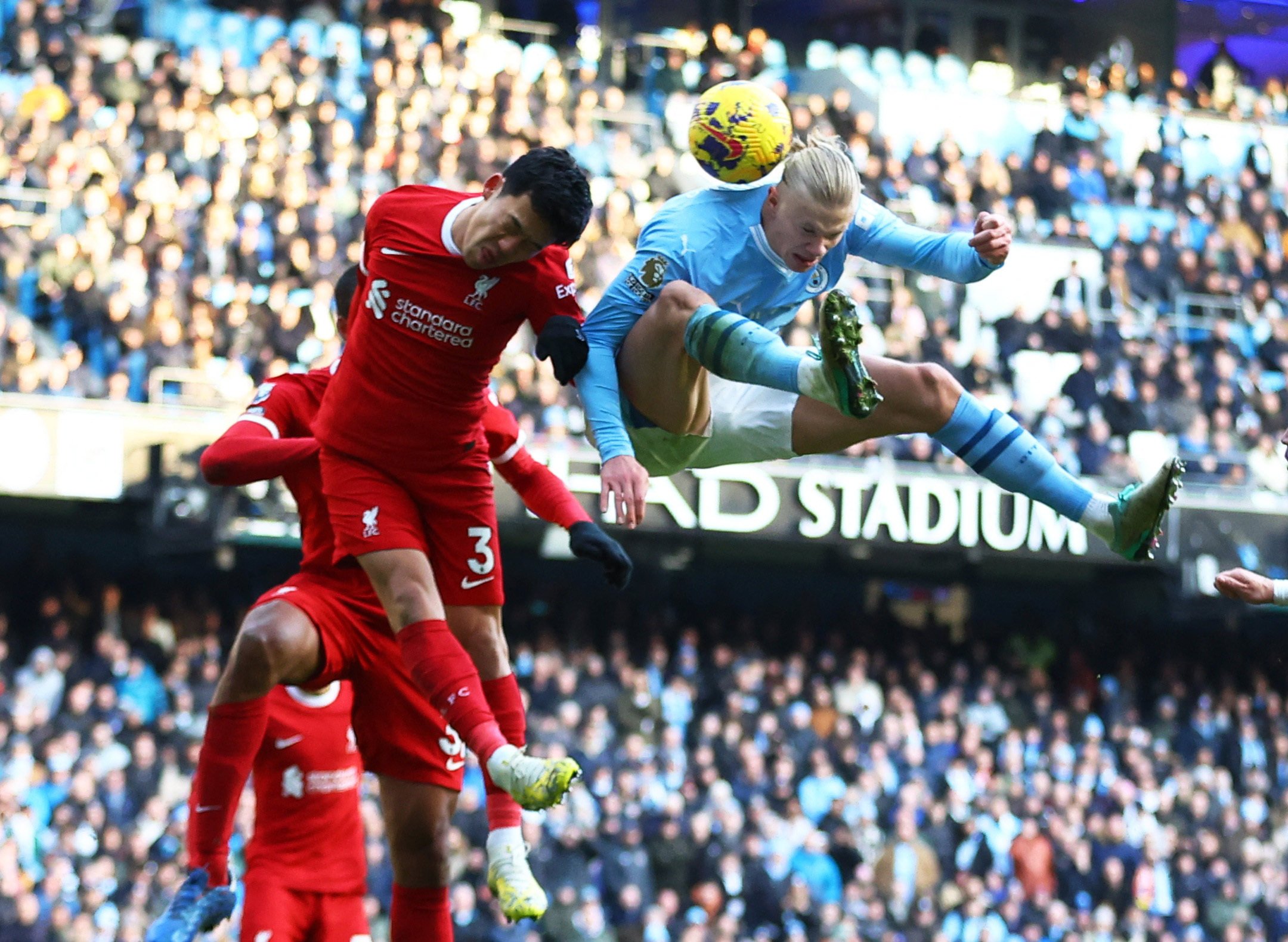 Manchester City’s Erling Haaland outjumps Liverpool’s Wataru Endo during their clubs’ Premier League clash last month. Photo: Reuters