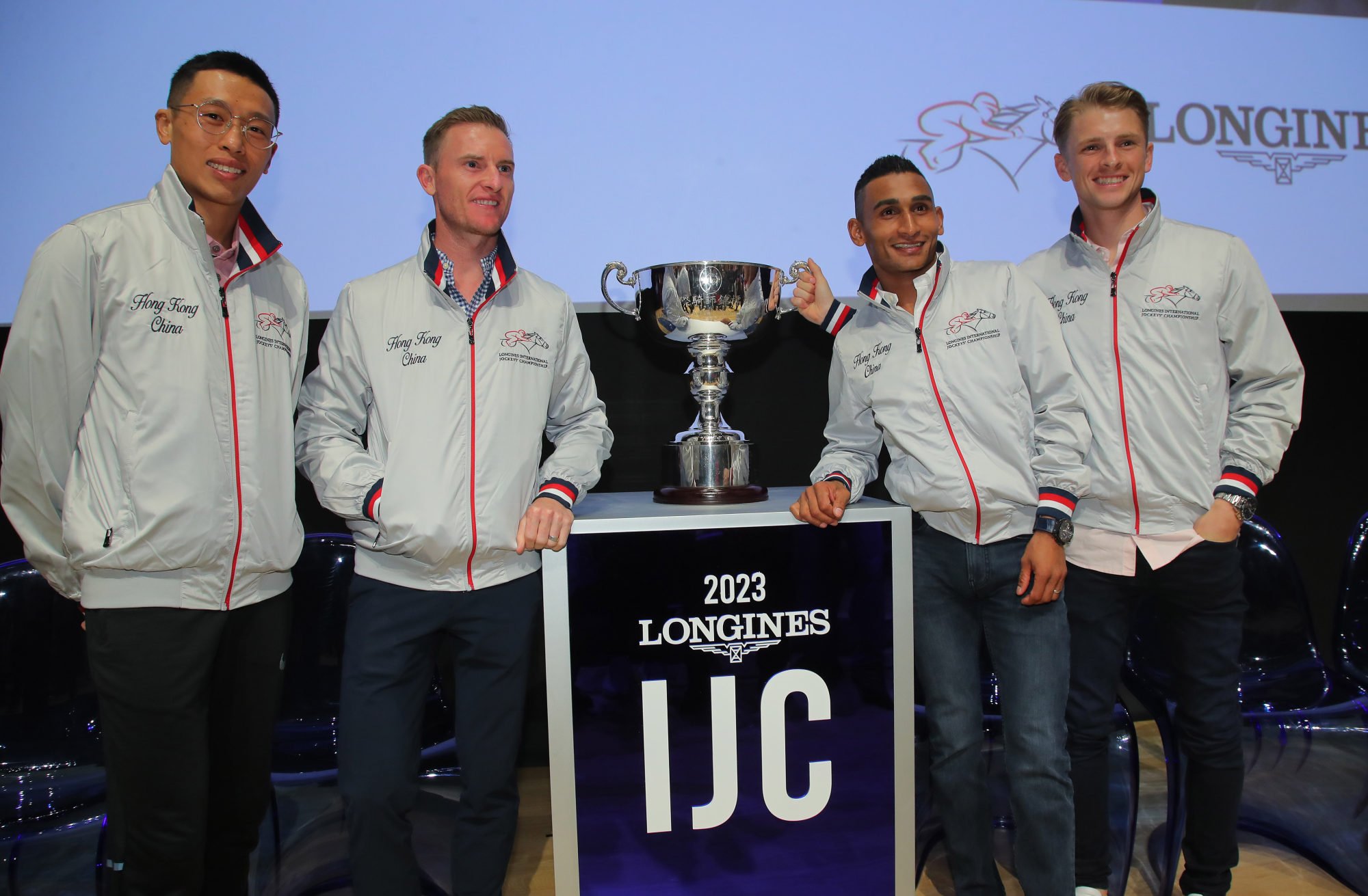 Vincent Ho, Zac Purton, Karis Teetan and Lyle Hewitson pose with the International Jockeys’ Championship trophy.