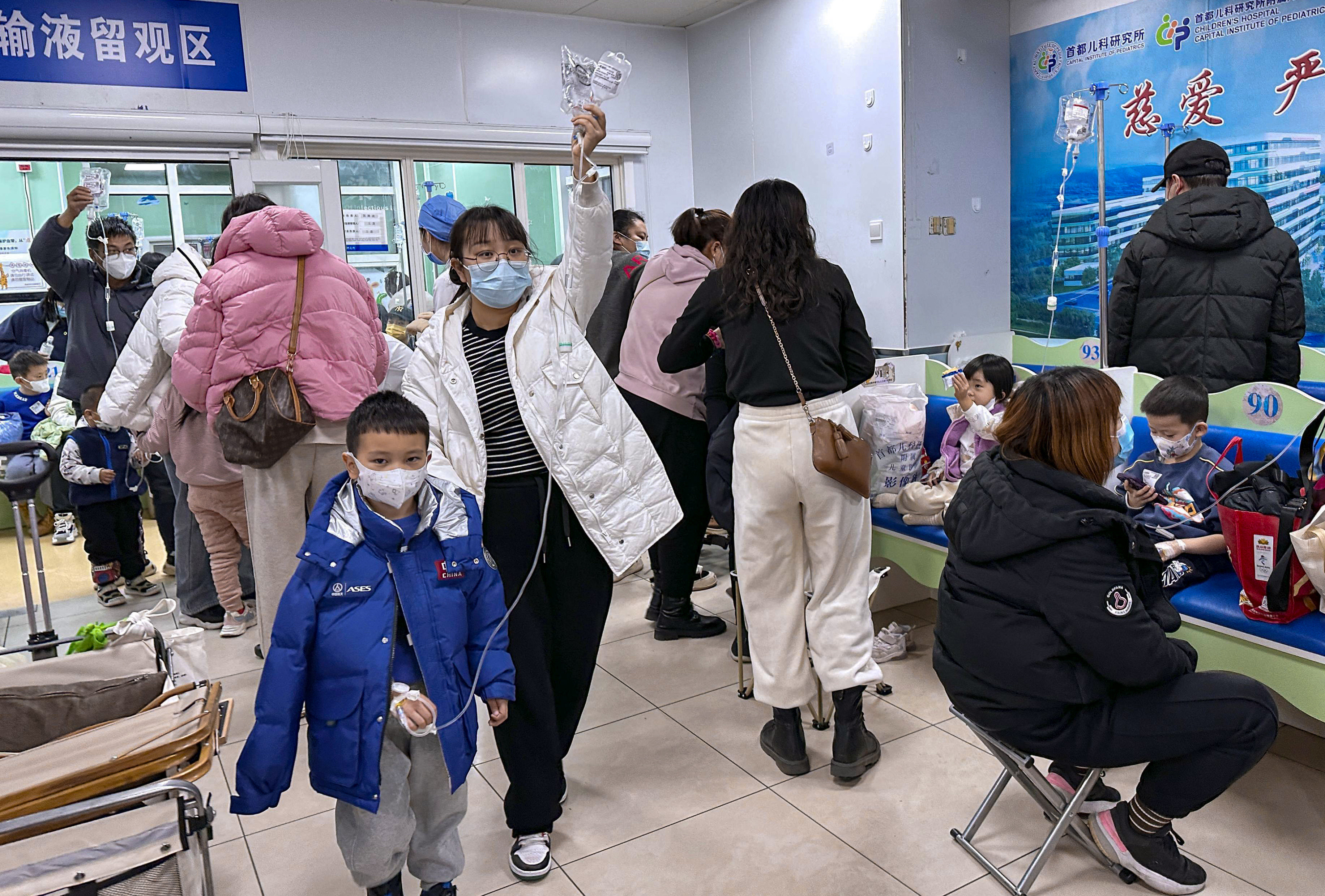 Children are hooked up to intravenous drips at a hospital in Beijing last week. Photo: Kyodo