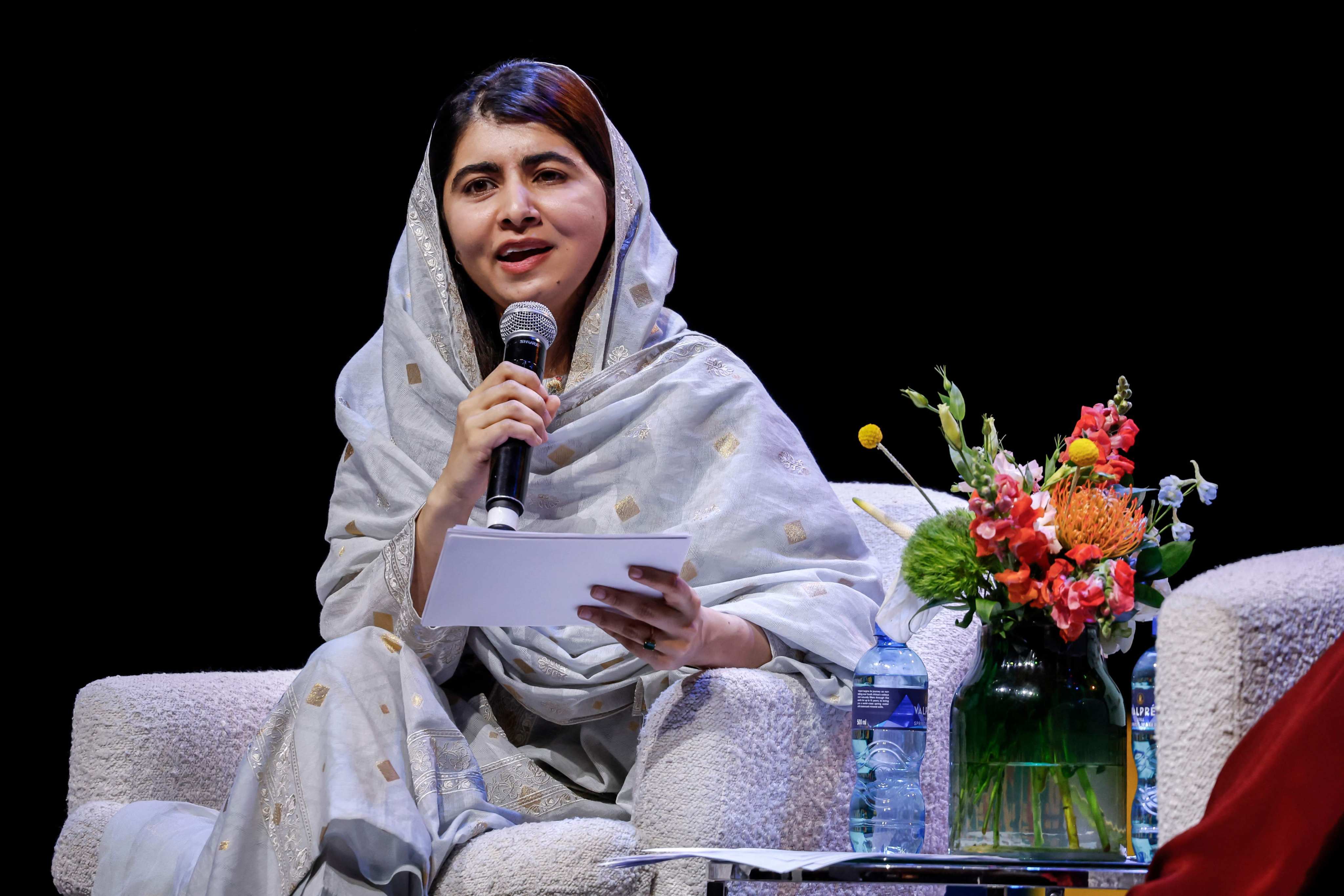 Nobel Peace Prize laureate Malala Yousafzai takes part in a panel discussion after delivering the 21st Nelson Mandela Annual Lecture in Johannesburg on Tuesday. Photo: AFP