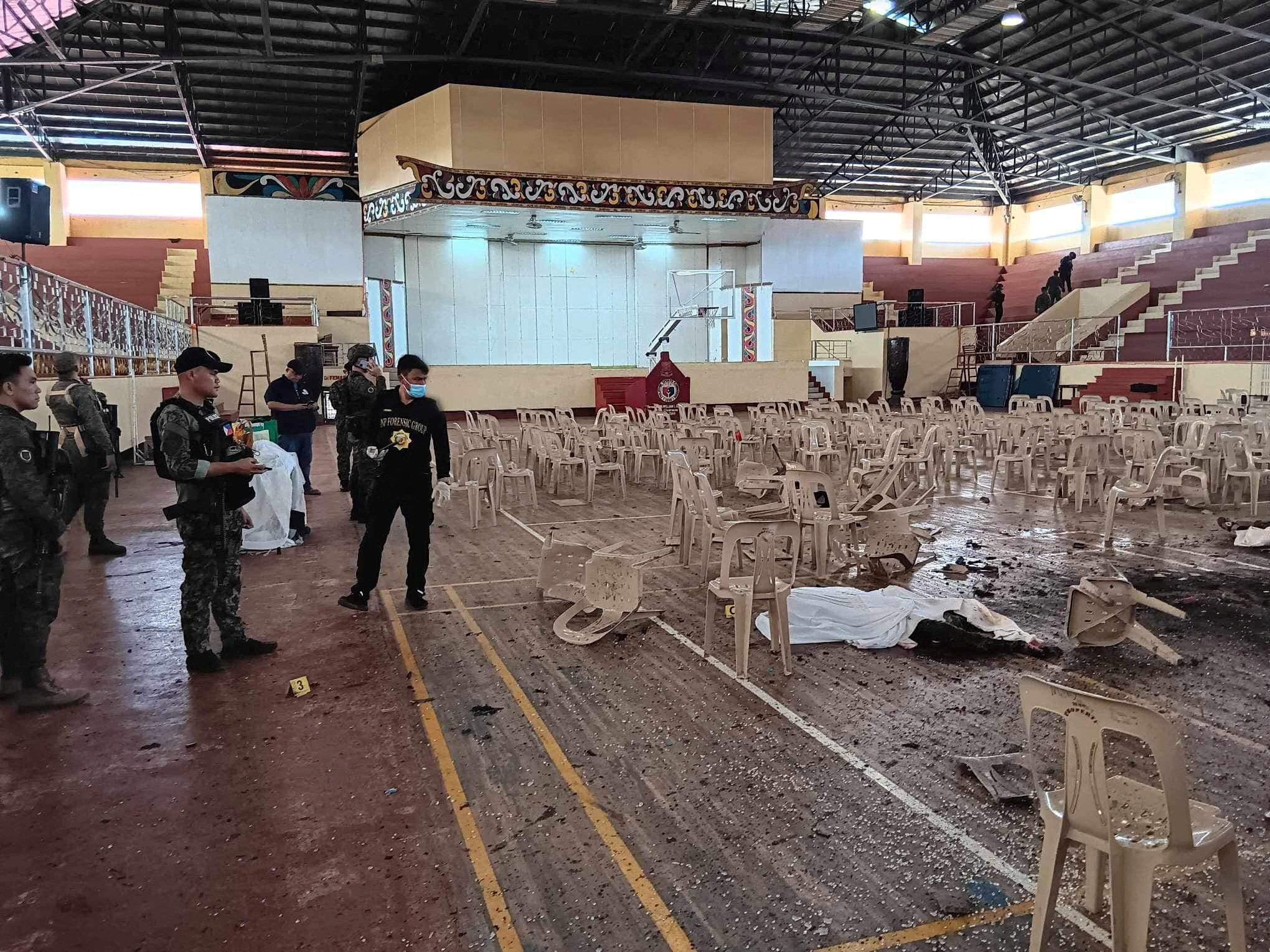 Officers investigate the scene of an explosion that occurred during a Catholic Mass in Marawi, Philippines. Photo: Lanao Del Sur Provincial Government/Handout via Reuters