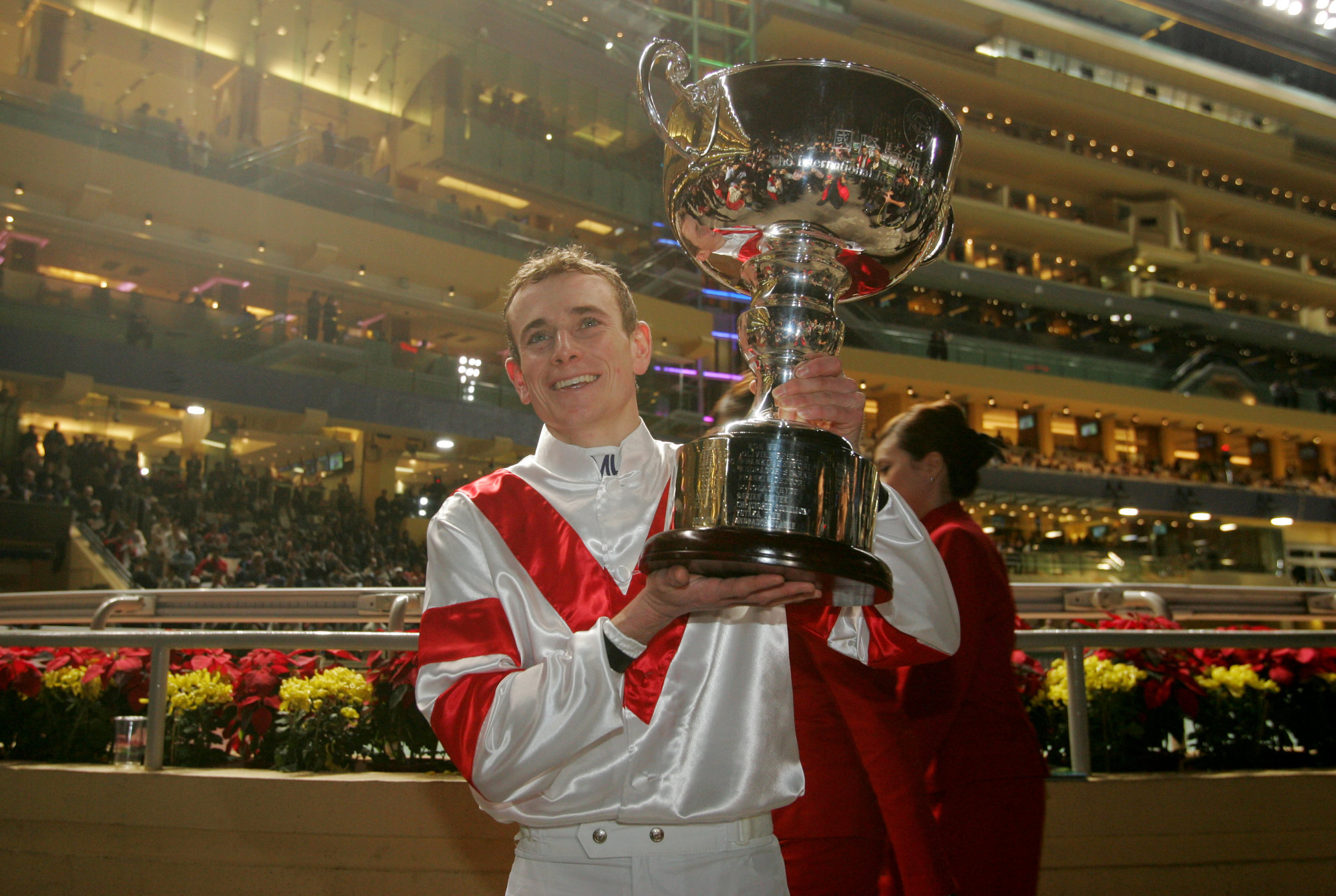 Ryan Moore lifts the 2010 International Jockeys’ Championship silverware.