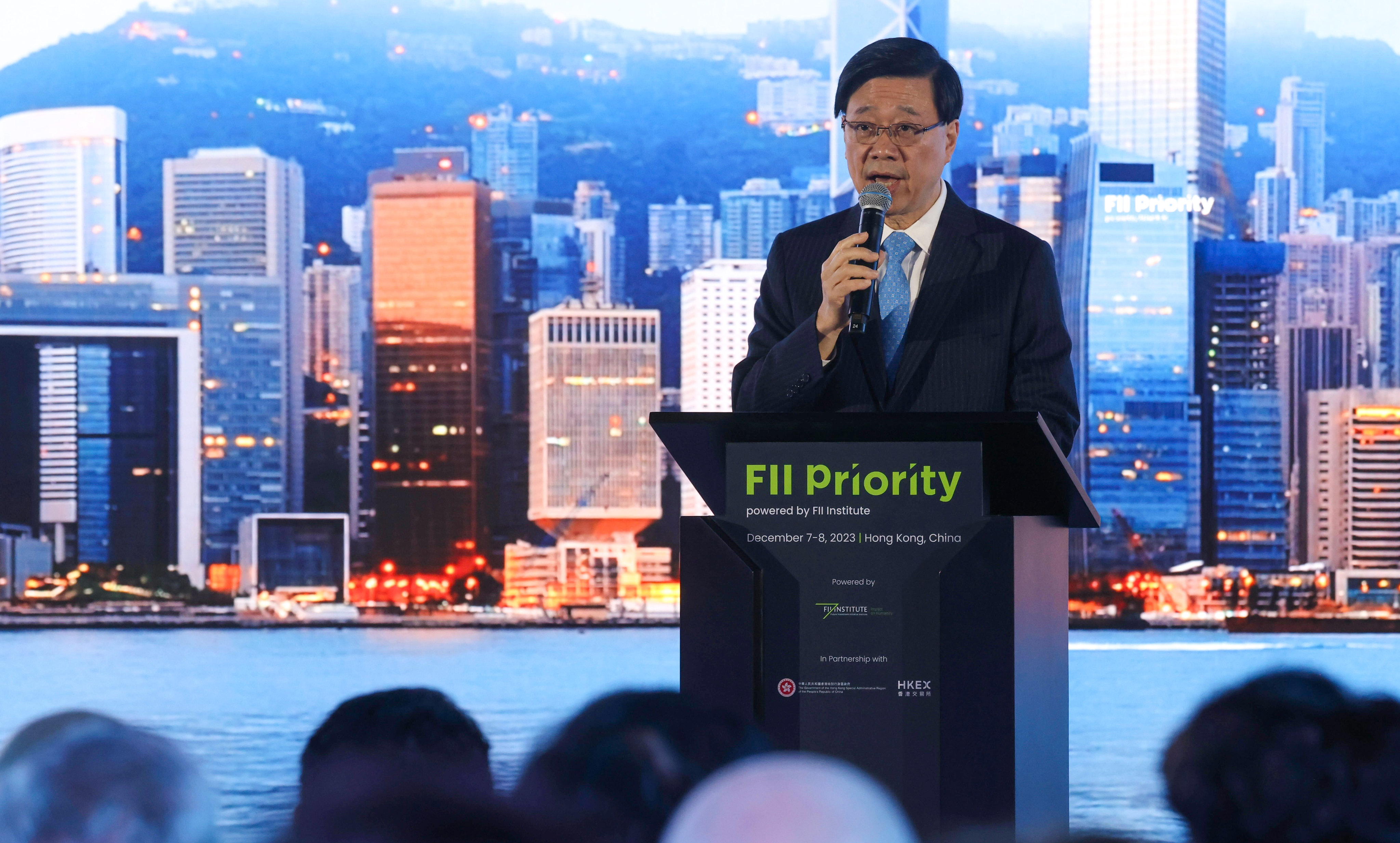Chief Executive John Lee delivers a keynote address on the first day of the FII Priority Hong Kong conference. Photo: Jonathan Wong