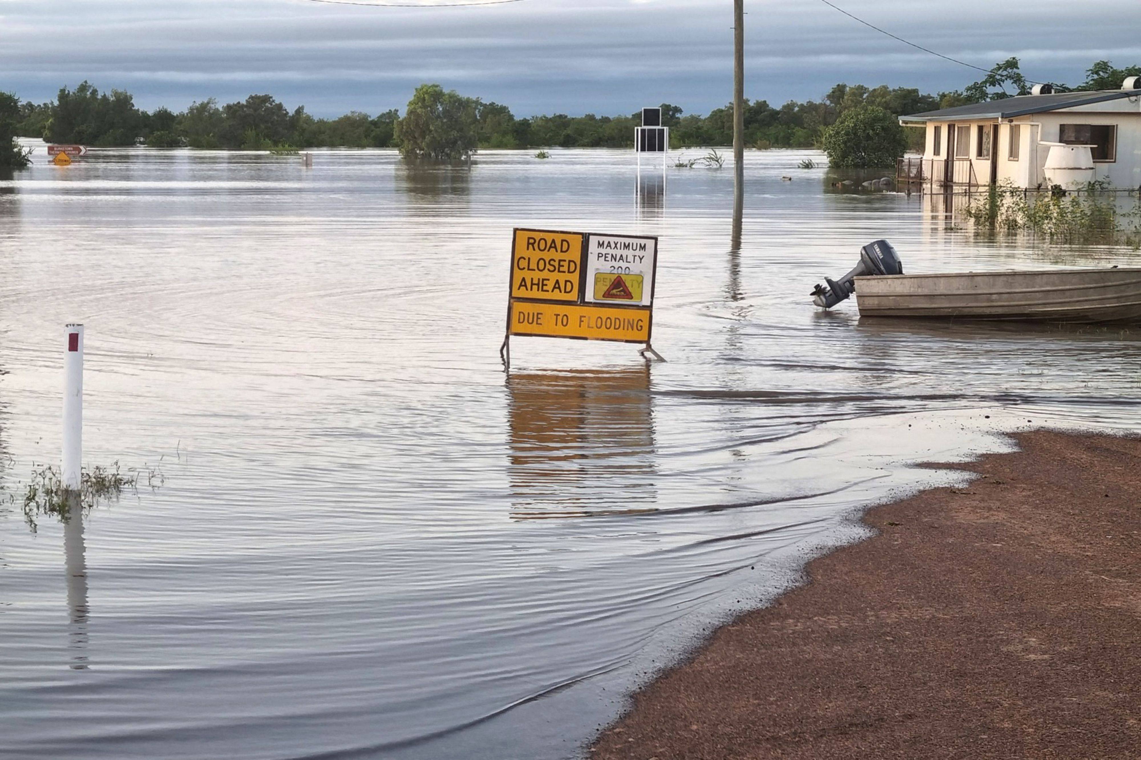 A photo taken on March 10, 2023 shows a flooded street in the town of Burketown in northern Queensland, Australia. Photo: AFP / Queensland Police