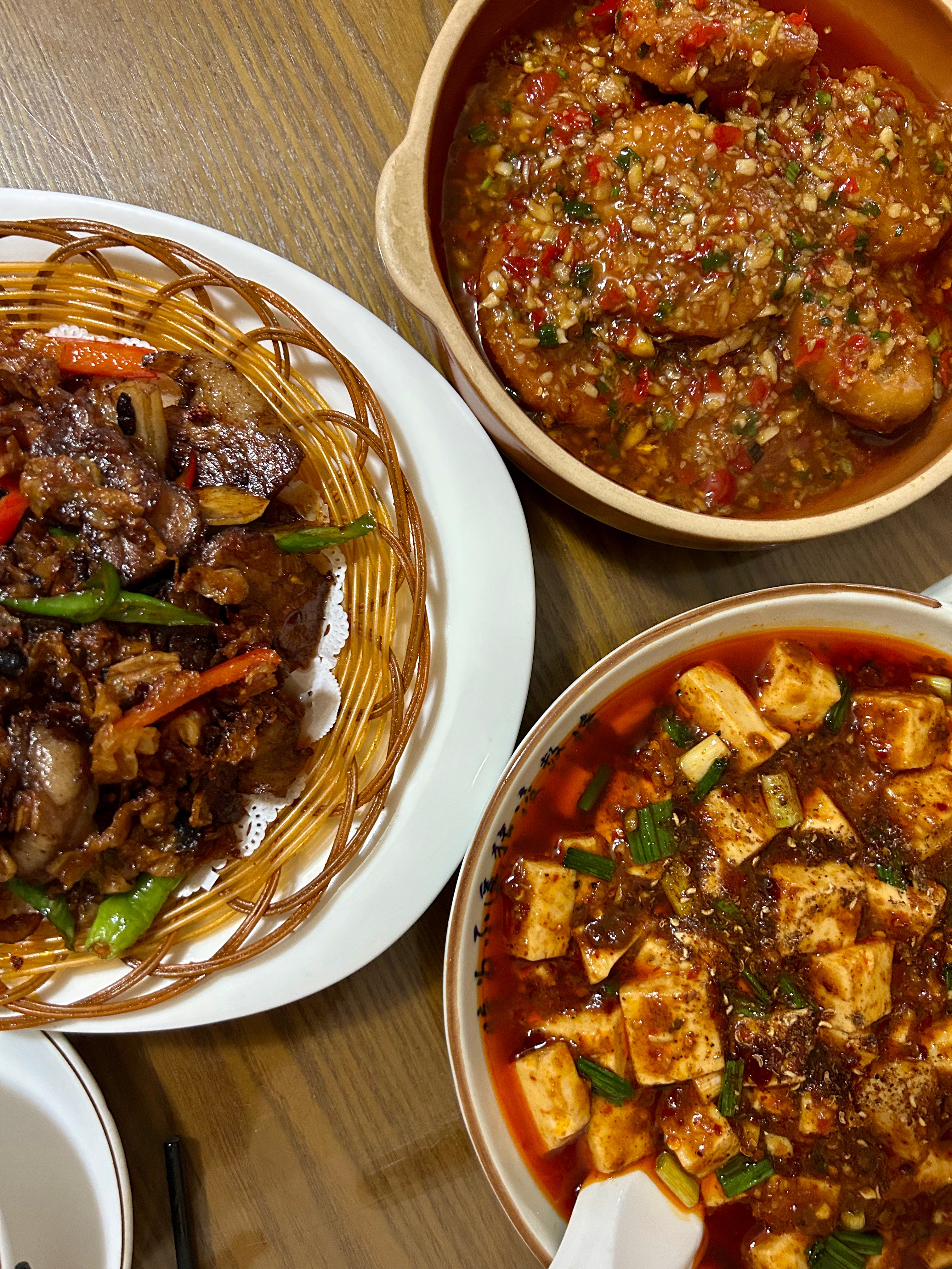 Sichuan pork stir fry (left) and Mapo tofu with Sichuan numbing peppers (right in Chengdu, China. On a visit to Chengdu, in Sichuan province, a writer has a culinary epiphany. Photo: Ian Neubauer