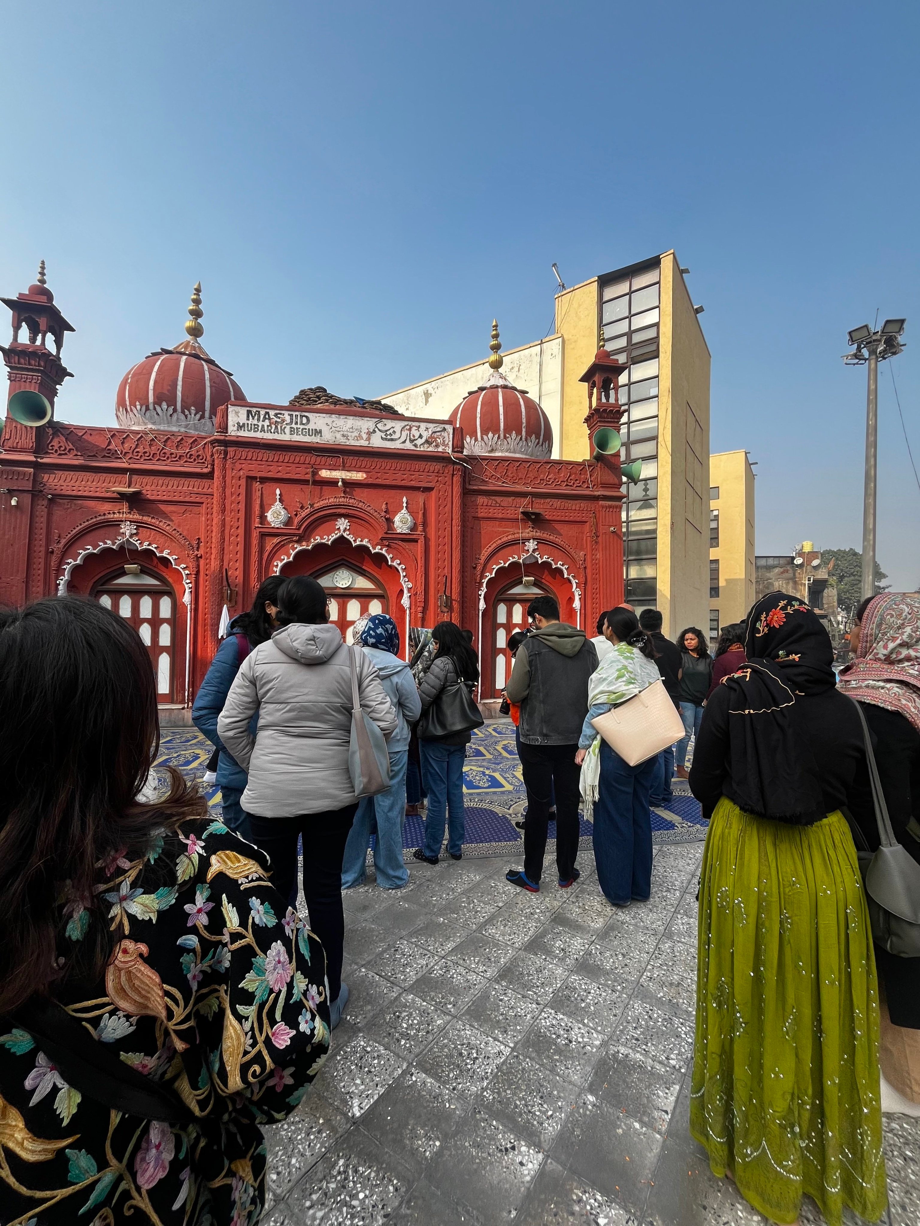 Heritage walk participants stop by the Mubarak Begum mosque in Delhi. Photo: Bibek Bhandari