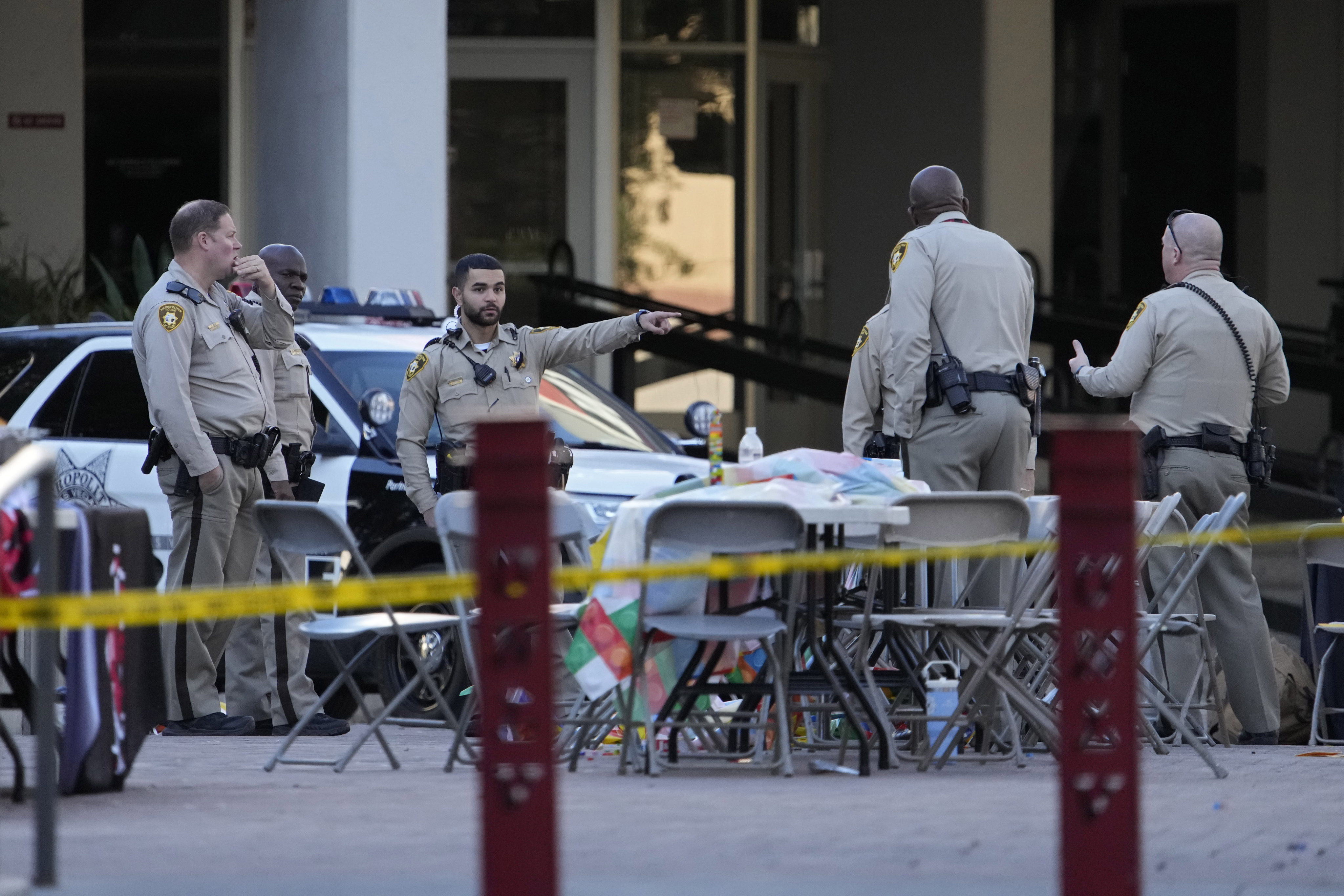 Police stand near the scene of a shooting at the University of Nevada, Las Vegas, on December 7. Photo: AP