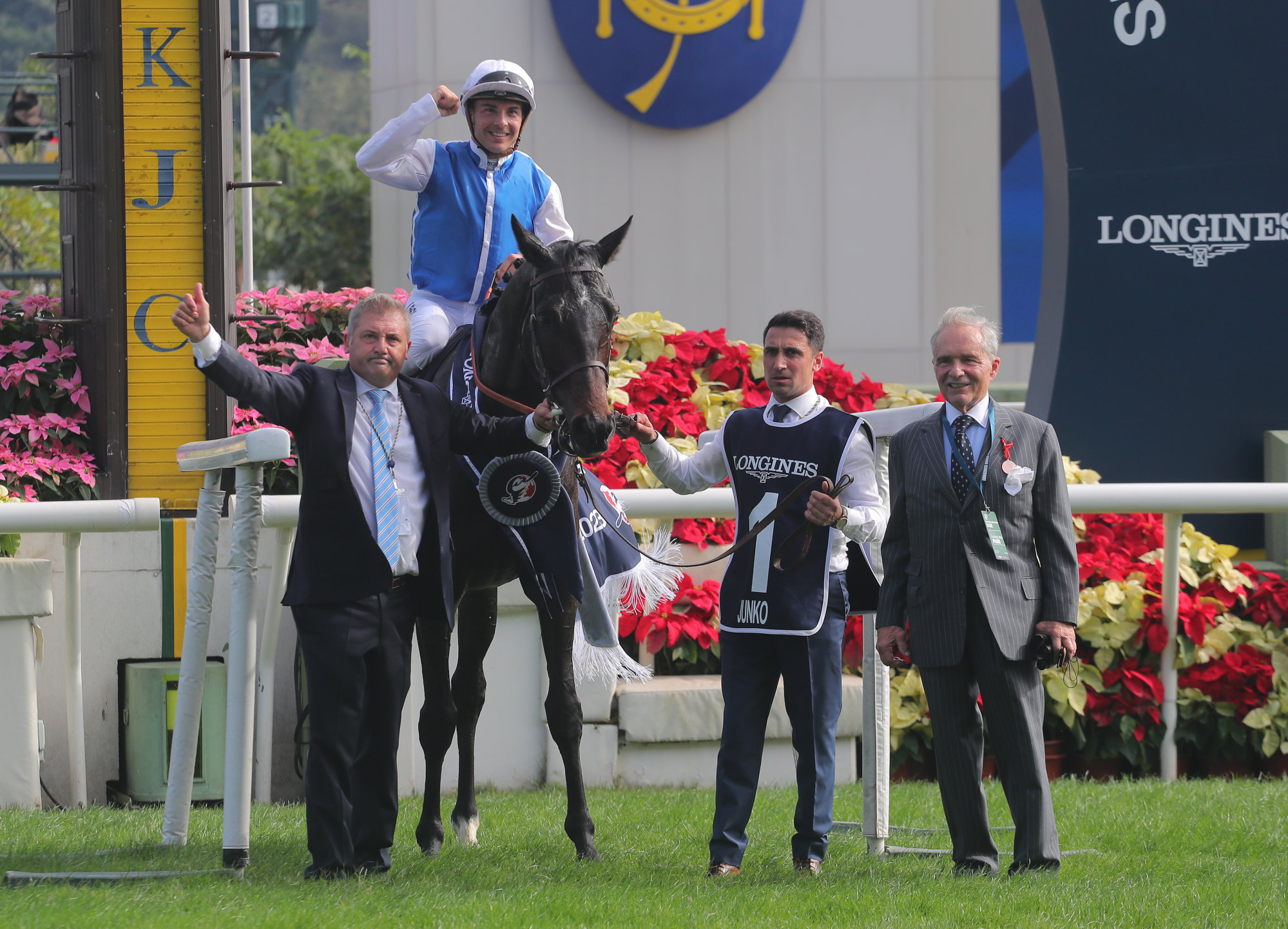 Andre Fabre (right) enjoys Junko’s Group One Longines Hong Kong Vase (2.,400m) victory with other connections.