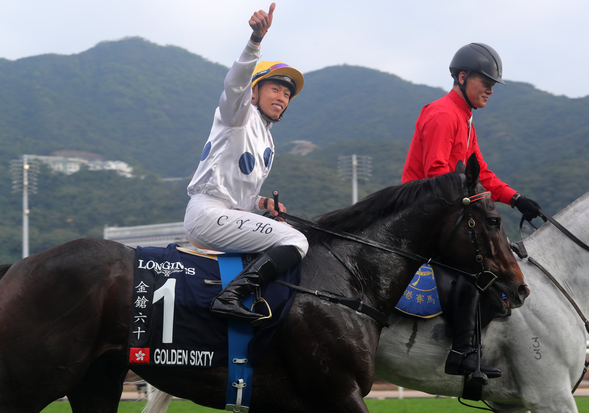 Vincent Ho celebrates after teaming up with Golden Sixty to win the Hong Kong Mile.