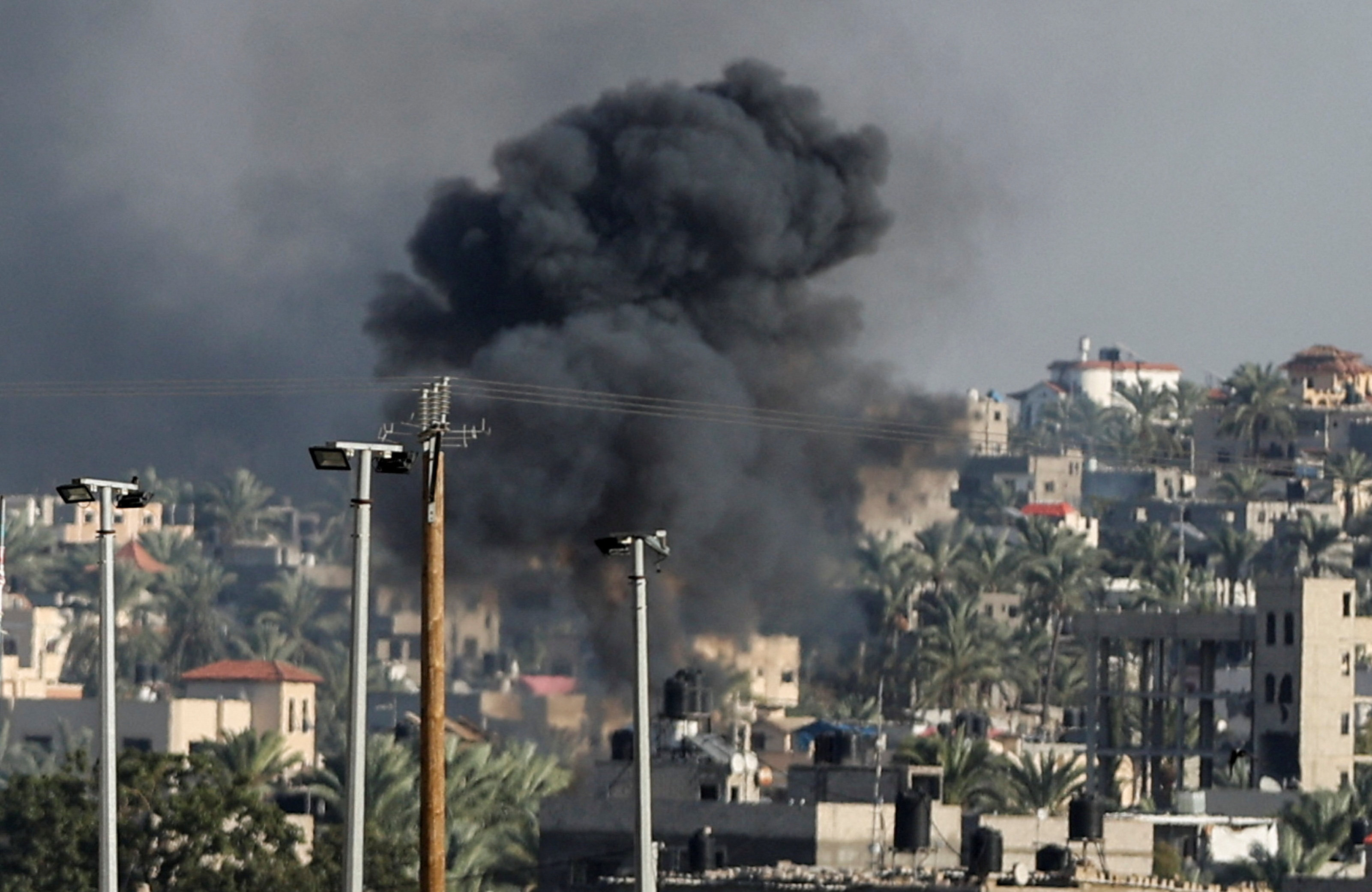 Smoke rises after an Israeli strike in Khan Younis, southern Gaza Strip, on Saturday. Photo: Reuters
