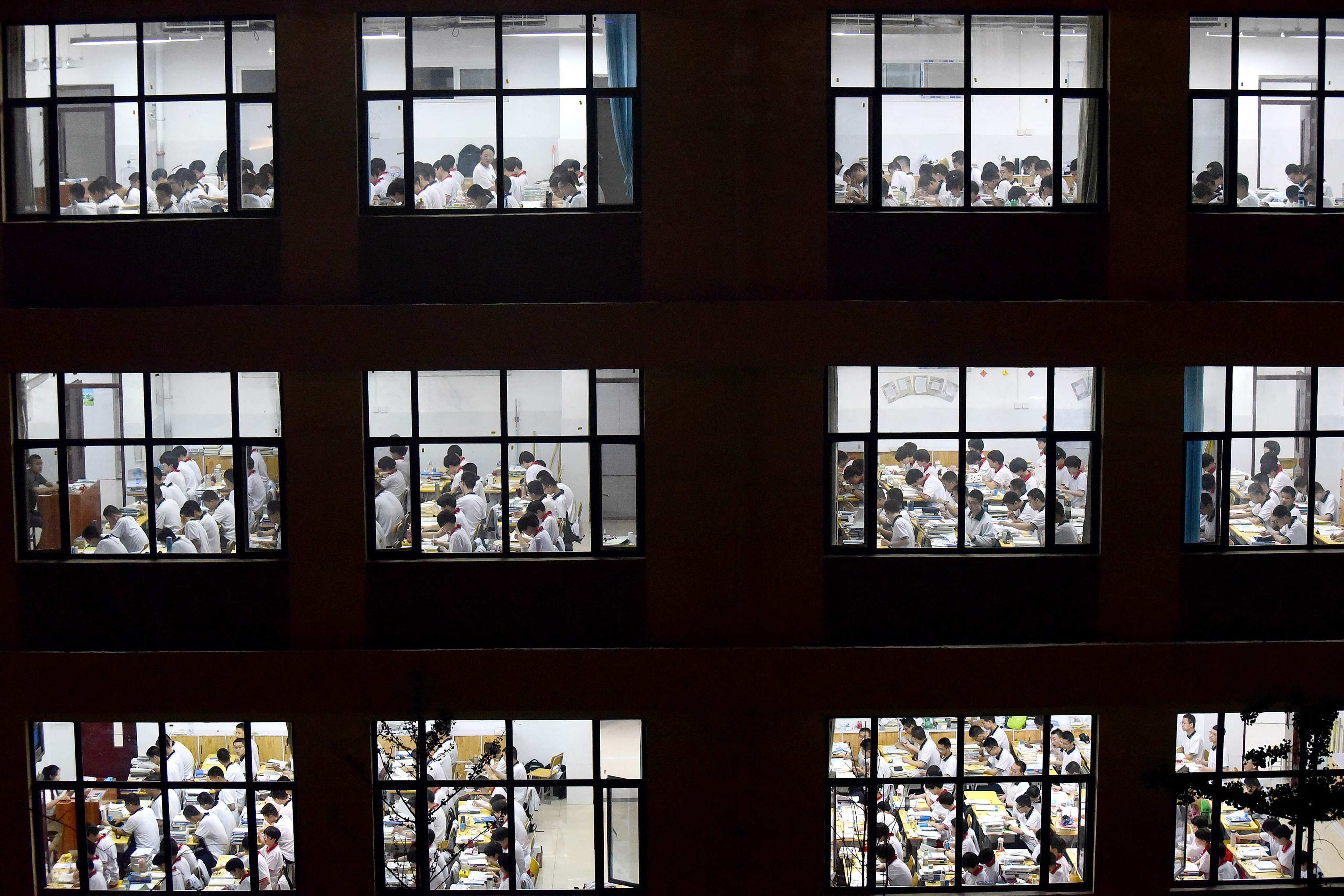 High school students go through exam papers ahead of the gaokao in Handan, northern Hebei province, China, on May 17. The uncomfortable news from the Pisa survey is that, globally, academic achievement levels have been flatlining since 2012. Photo: AFP
