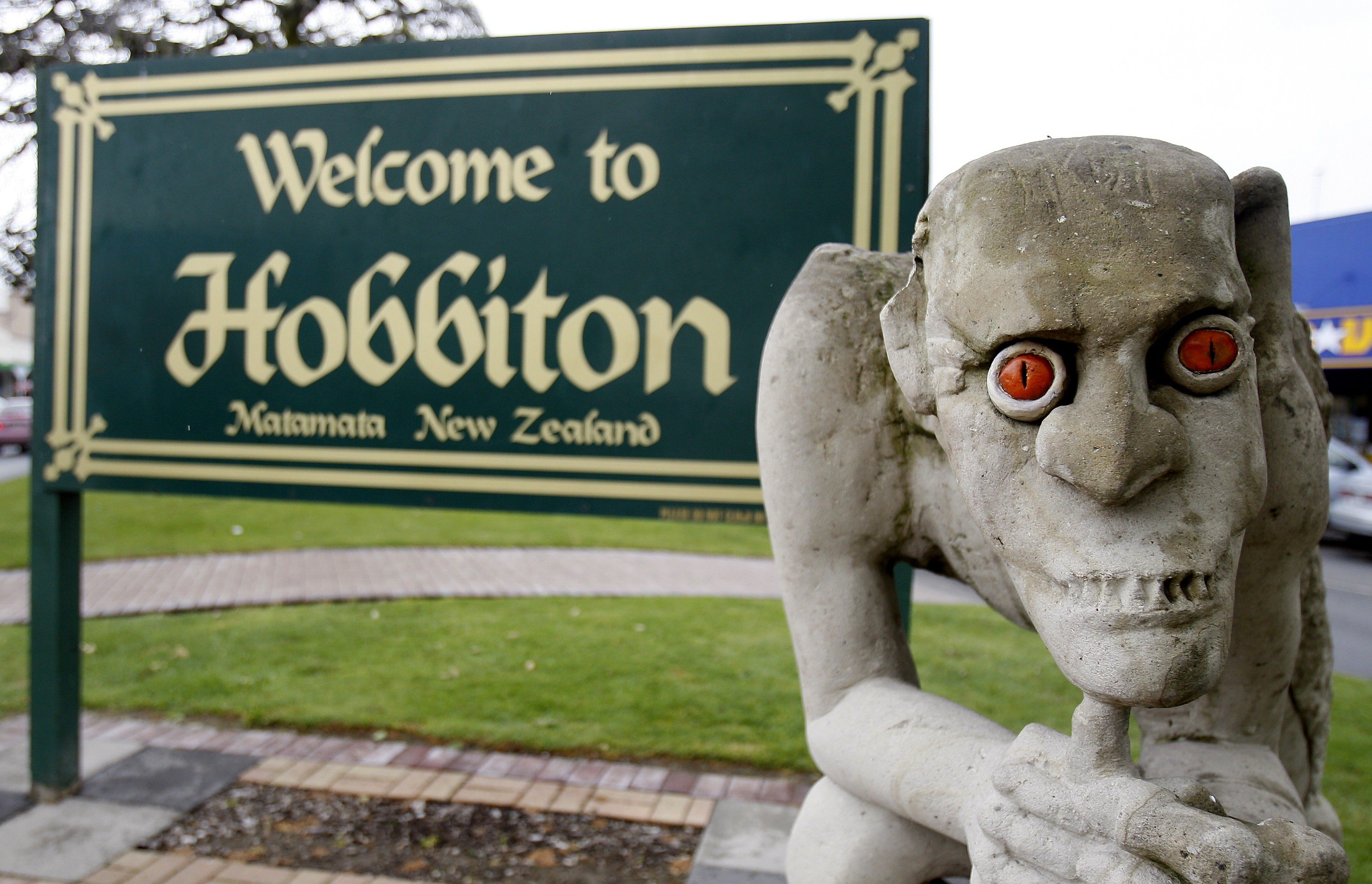 A sculpture of Gollum, the villainous “Lord of the Rings” hobbit, stands in front of a welcome sign in Hobbiton Town, Matamata, New Zealand. Photo: AP