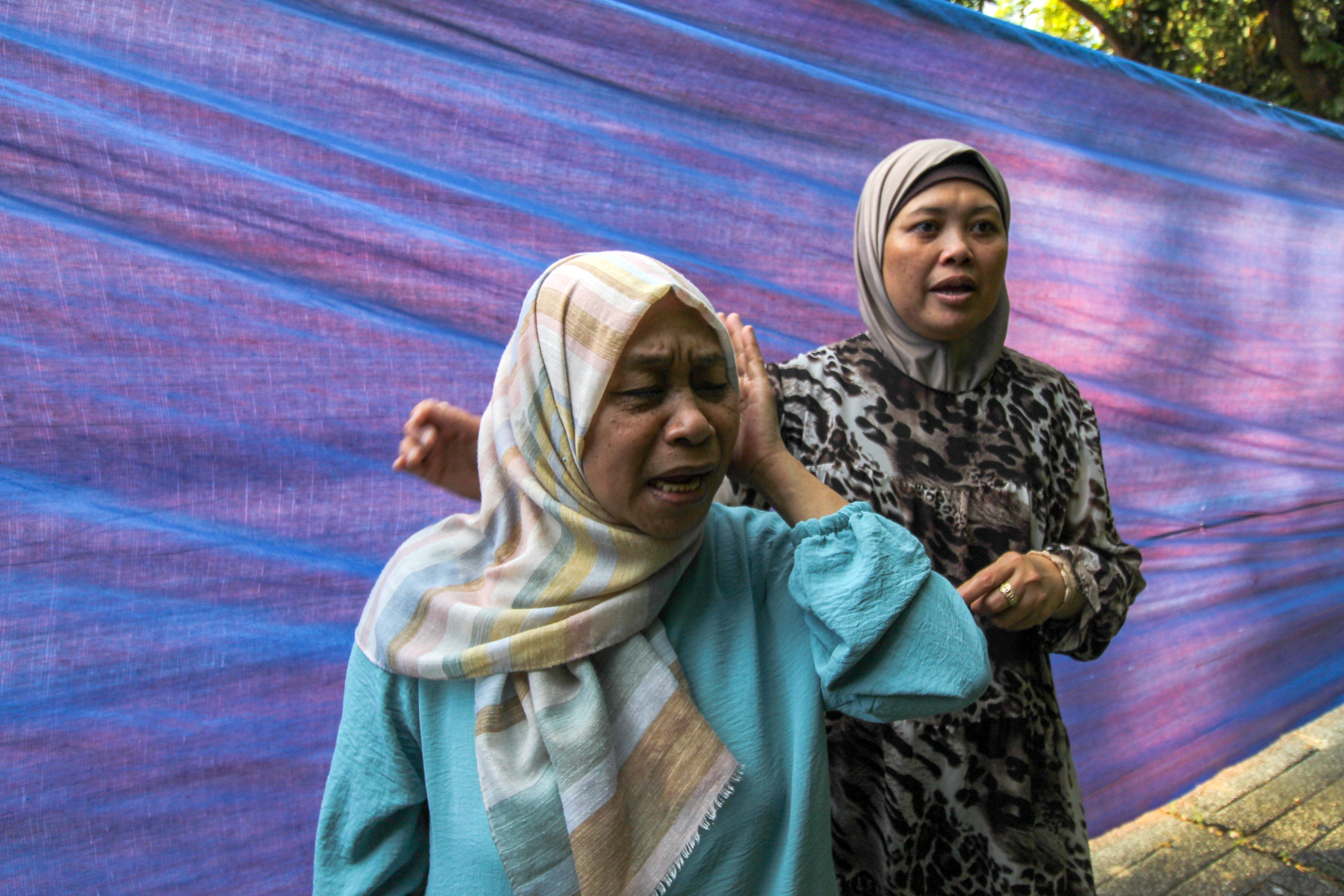 Revelina and Annel returned to the Philippines with their families from Gaza in November 2023. Photo: Michael Beltran