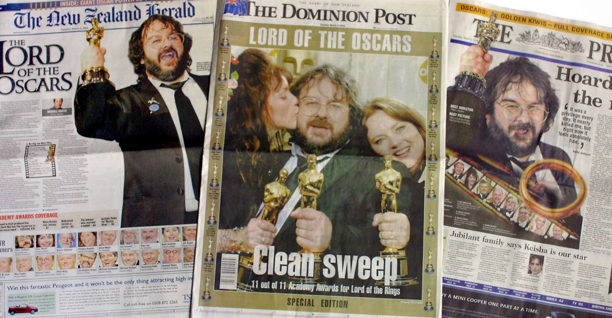 Three main New Zealand newspapers sport front-page stories of the 11 Oscar-winning team of “The Lord of the Rings: The Return of the King” in Auckland, Tuesday, March 2, 2004. Photo: AP