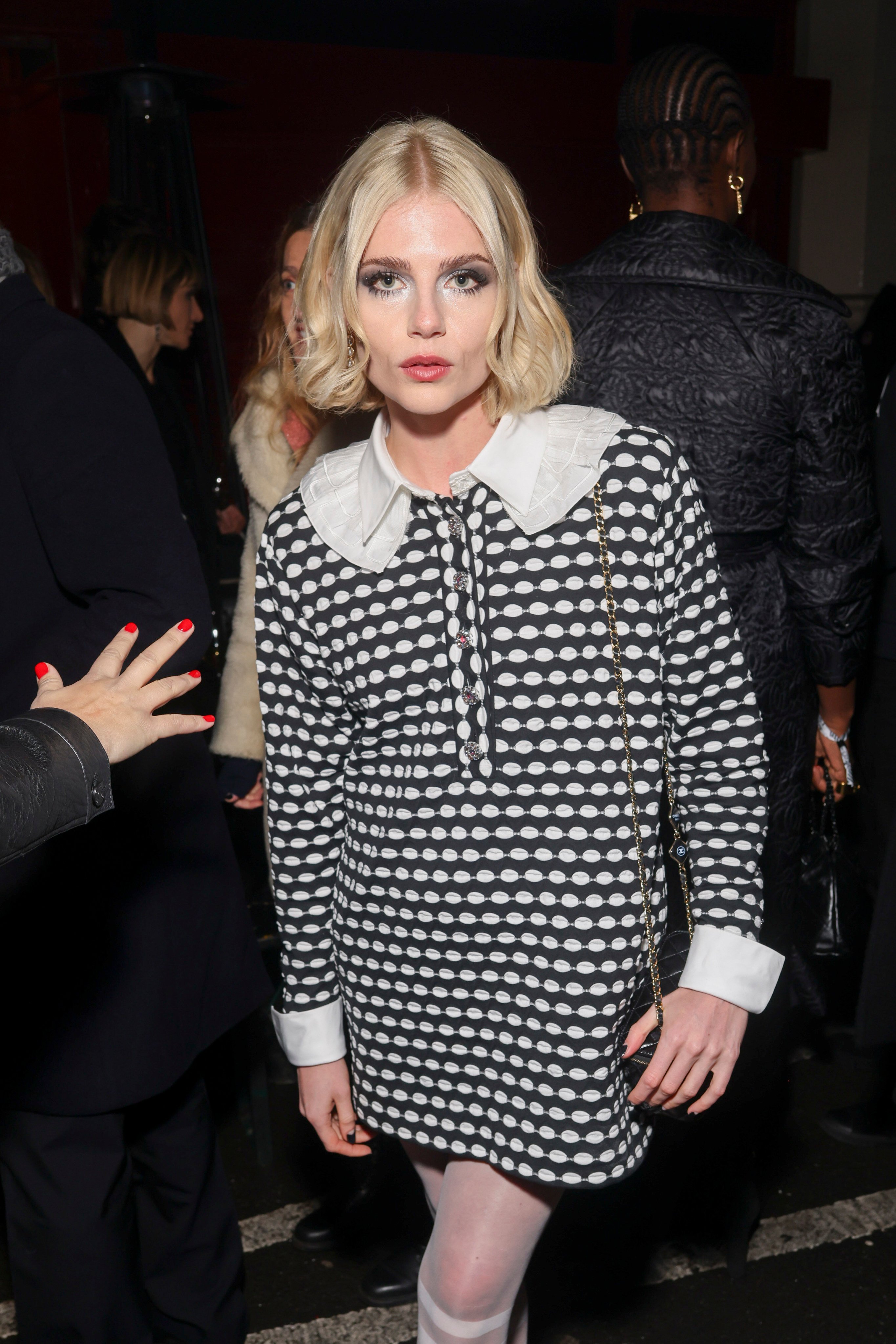 Lucy Boynton attends the Chanel Métiers d’Art show in Manchester, UK, on December 7. Photo: AP