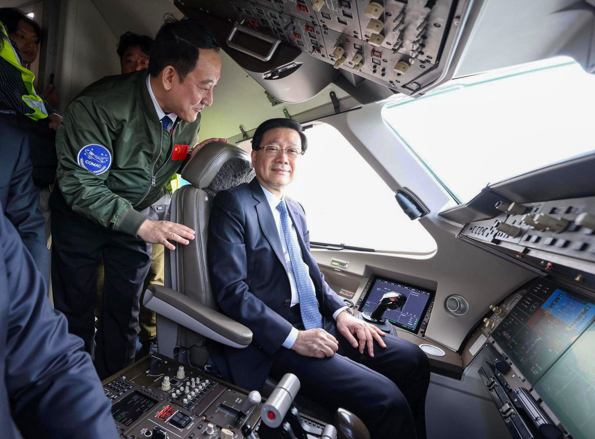 John Lee poses for a picture on the C919. The arrival of the home-grown jets demonstrates national support for the city’s aviation industry, Lee said. Photo: Facebook/John Lee
