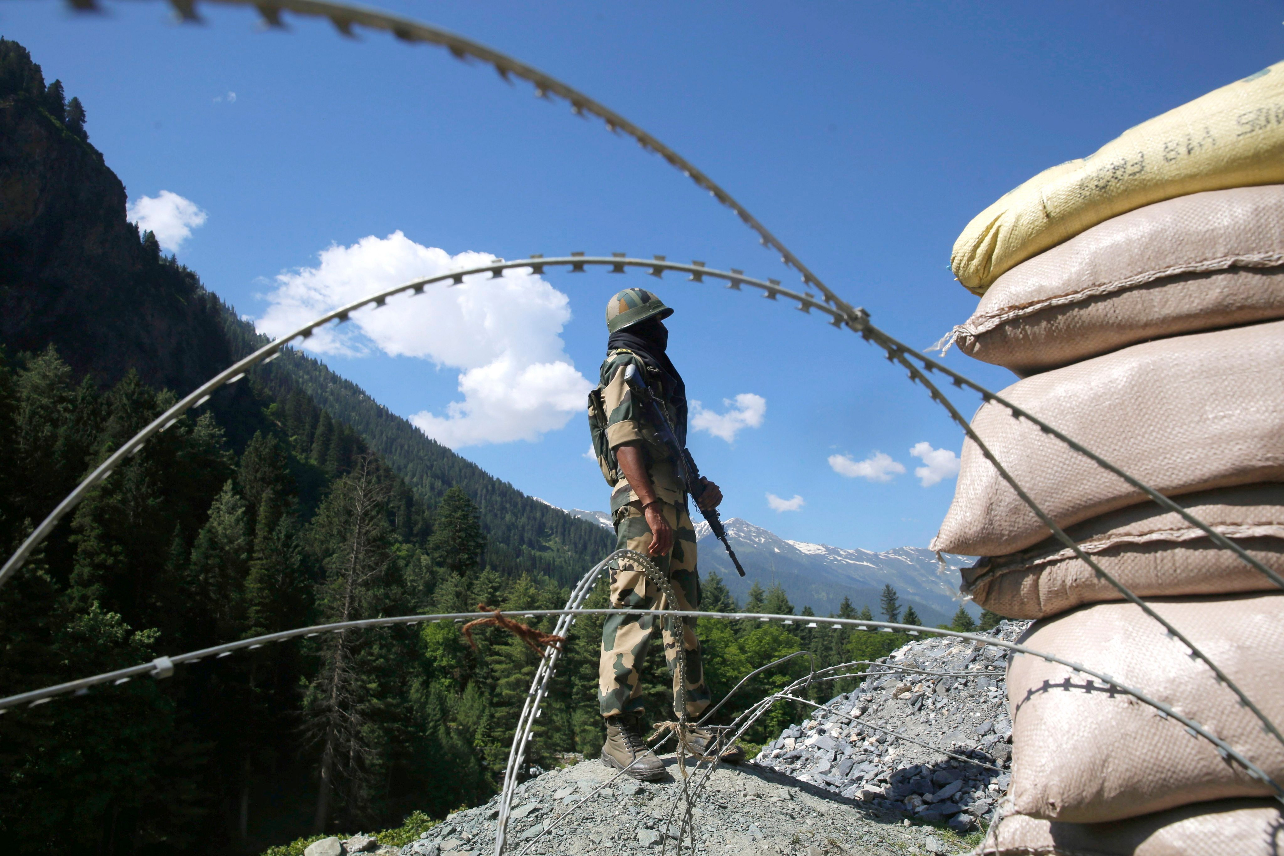 A paramilitary soldier at a check post on the Indian side of the Line of Actual Control in the remote border region between China and India. EPA