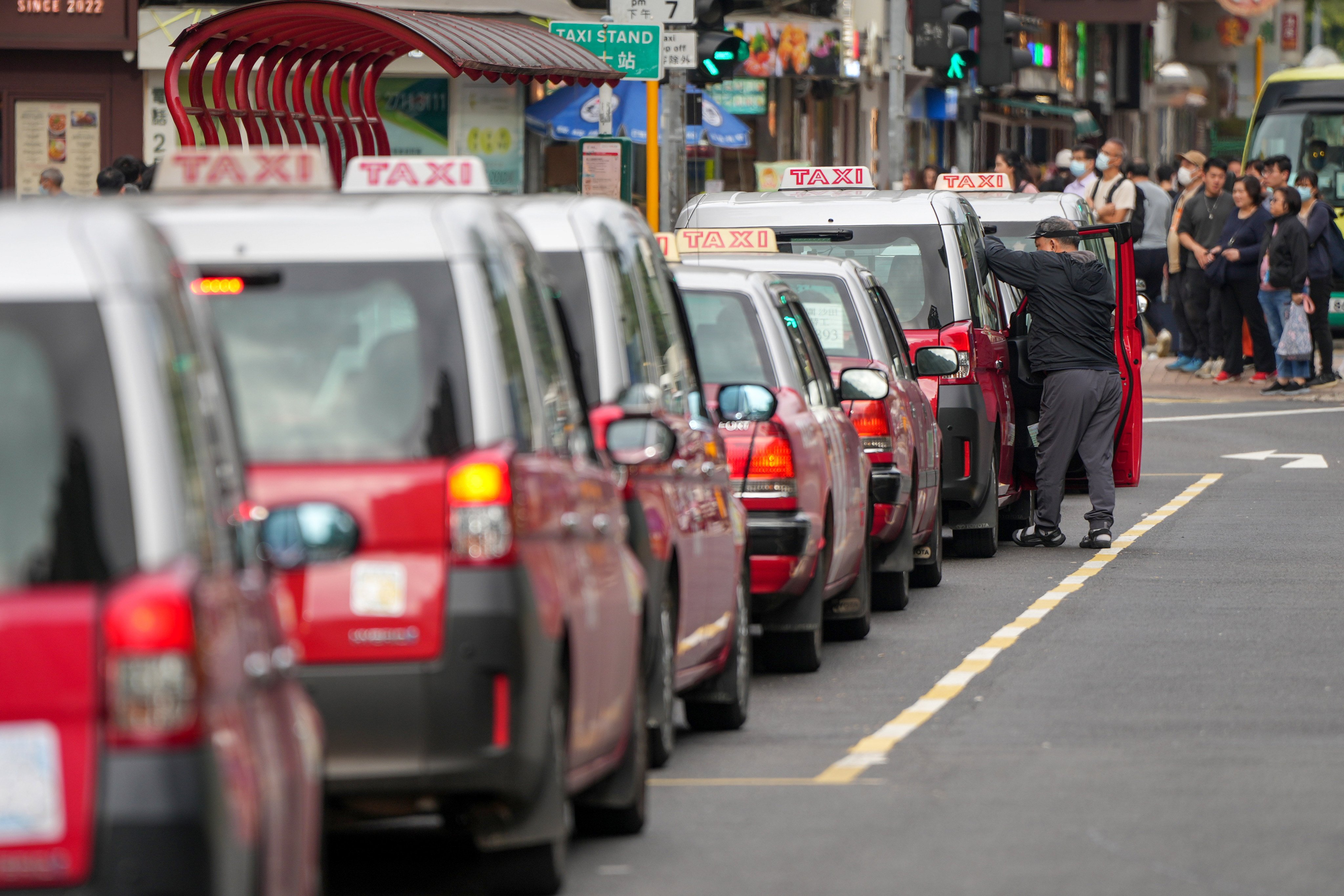 Under the system, taxi drivers will receive demerit points for 11 types of bad behaviour and face being disqualified from driving their cabs if they accumulate too many. Photo: Sam Tsang
