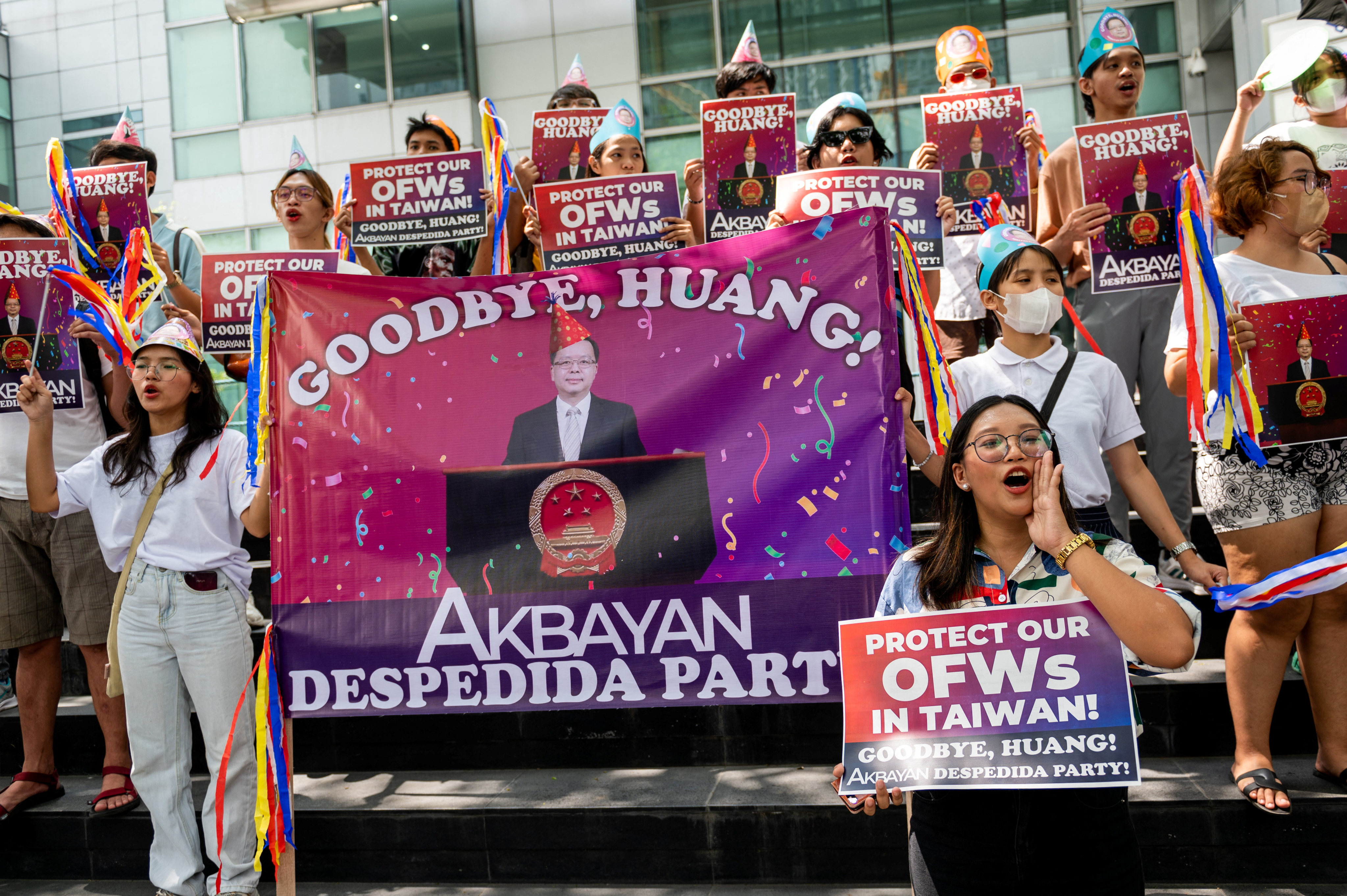 Filipino activists hold placards calling for the removal of Chinese Ambassador to the Philippines Huang Xilian in Makati City, Metro Manila, the Philippines, in April. Photo: Reuters