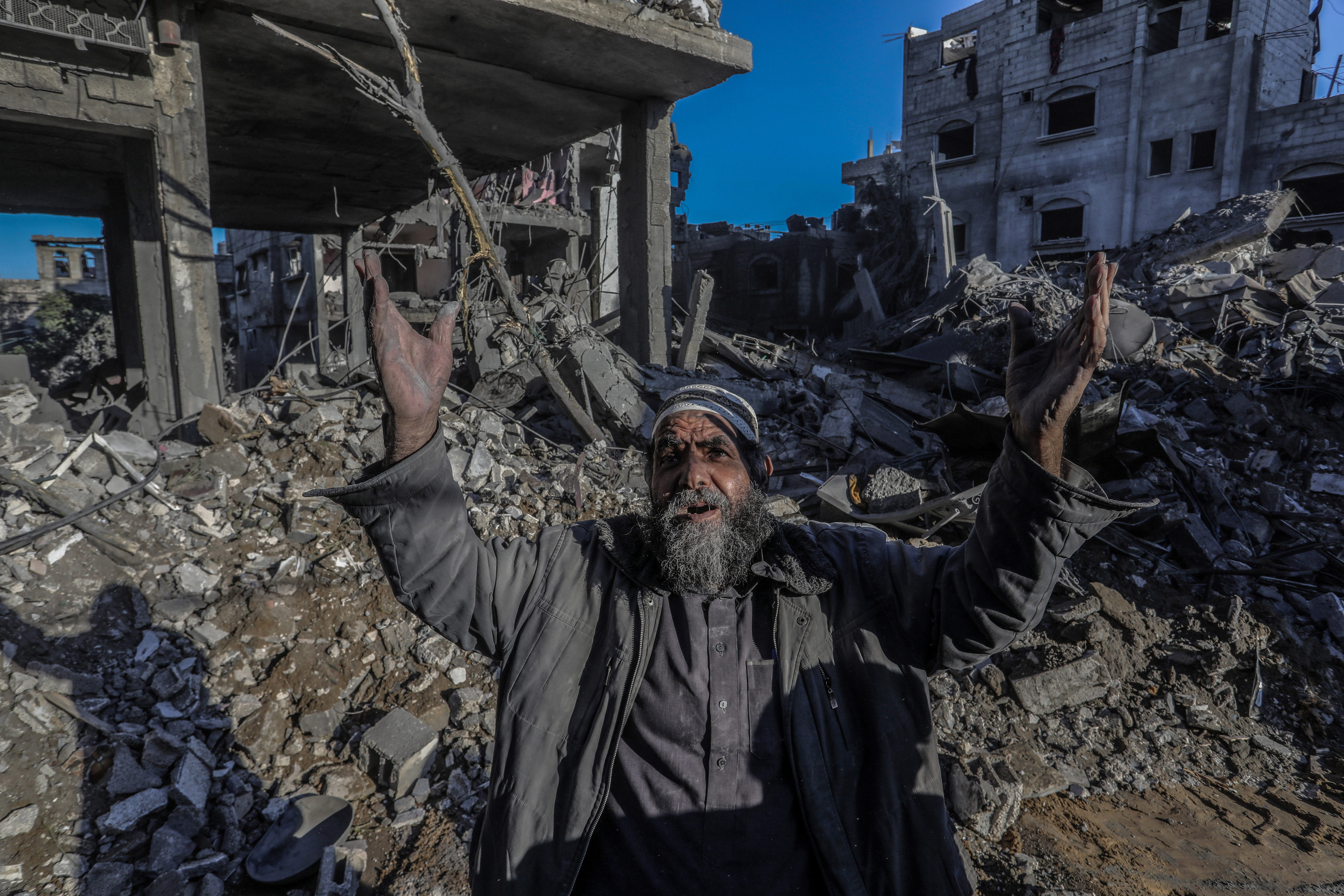 A Palestinian man reacts after an Israeli air strike on a house in the city of Rafah in the southern Gaza Strip. Photo: dpa