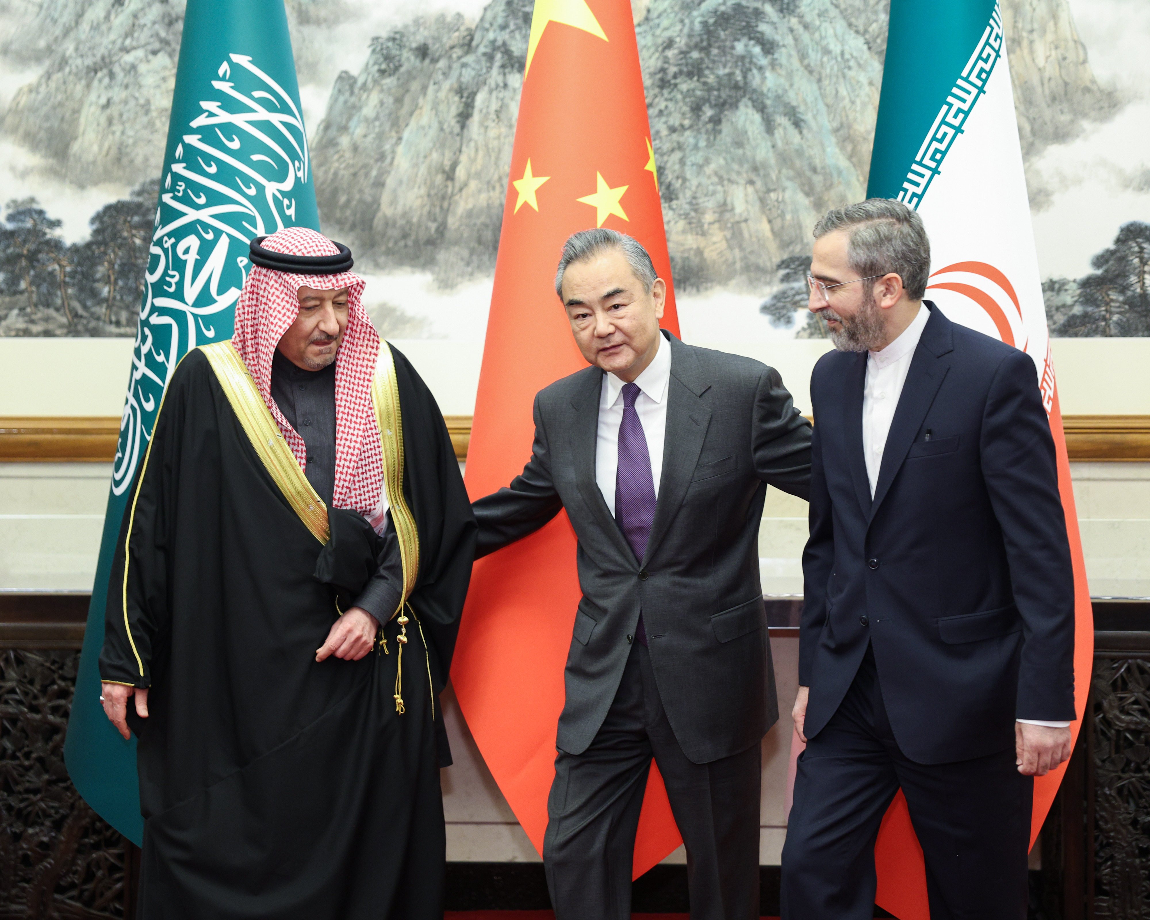During talks with Saudi deputy foreign minister Waleed Elkhereiji (left) and his Iranian counterpart Ali Bagheri Kani (right) in Beijing on Friday, Foreign Minister Wang Yi (centre) renewed China’s call for “an immediate ceasefire” in the Israel-Gaza war. Photo: Xinhua
