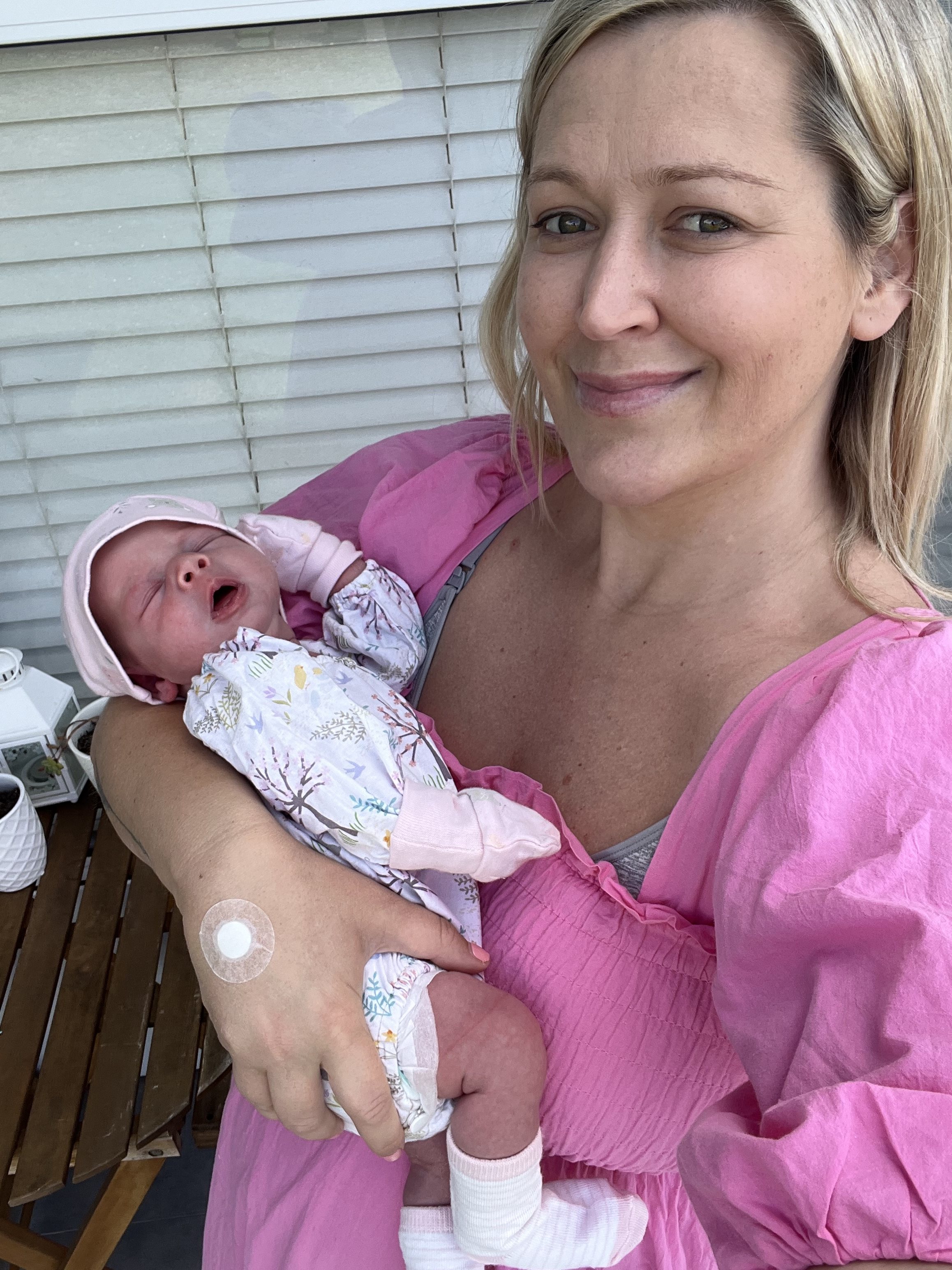 New mother Kellie Johnson with her weeks-old baby, Lola, born against the odds after her years of suffering with endometriosis. Photo: Kellie Johnson