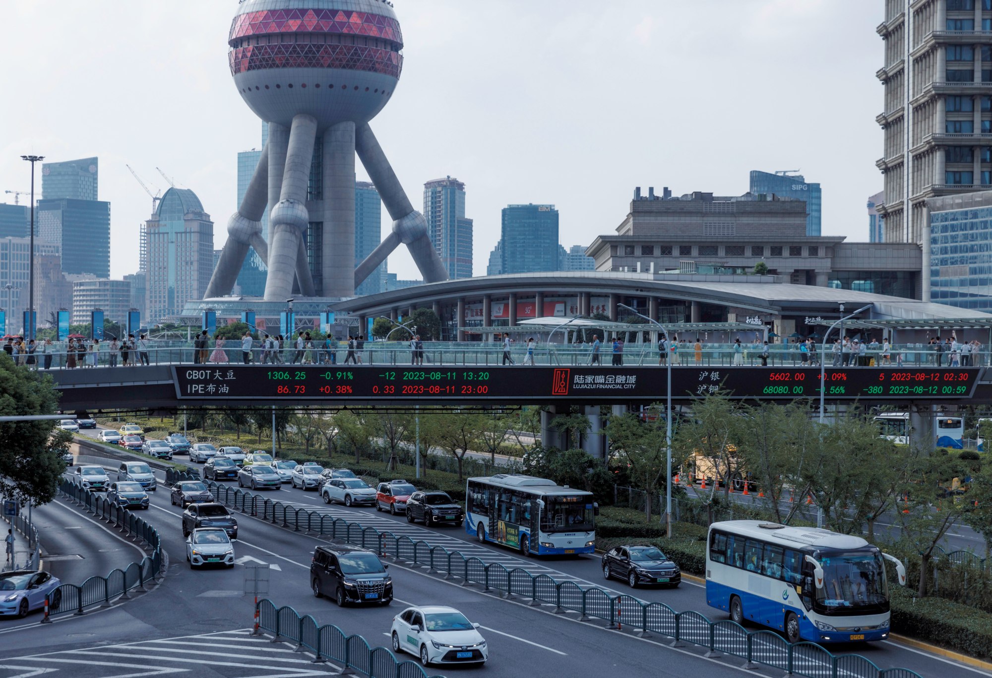 A pedestrian bridge in Shanghai displays stock exchange data. Photo: EPA-EFE