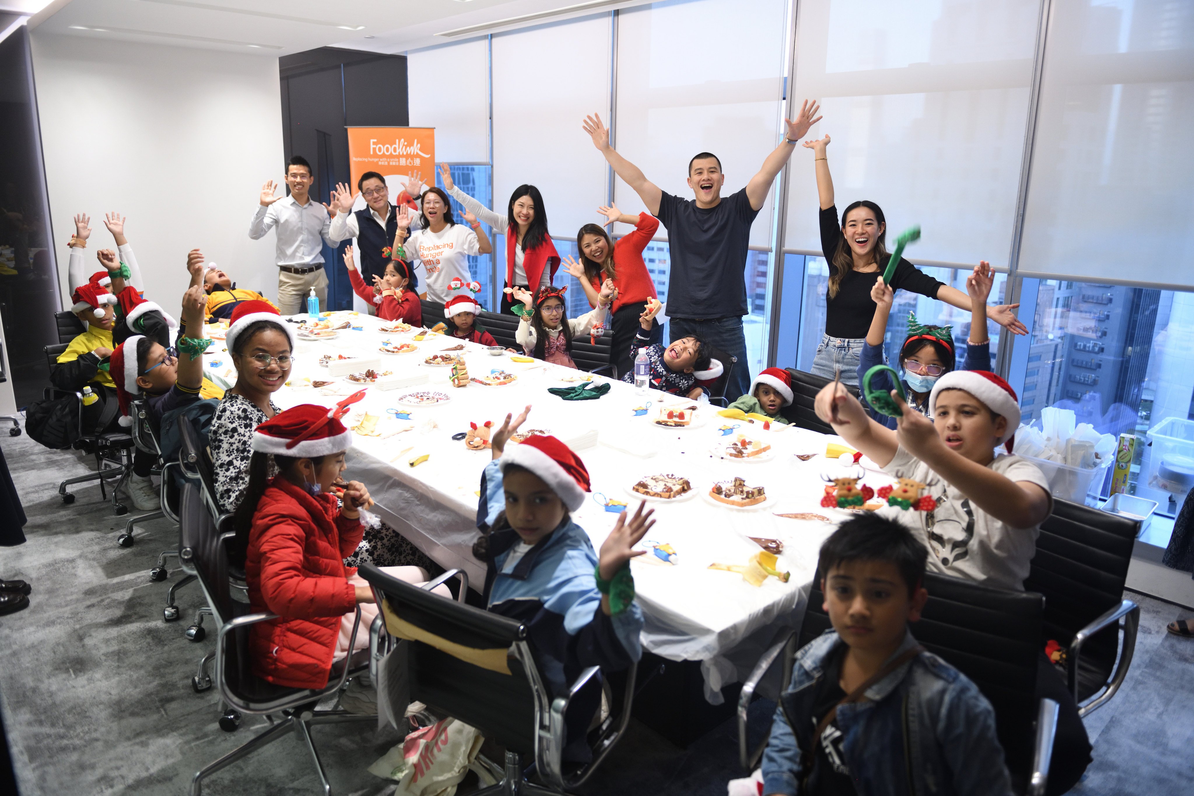Children enjoy a special Christmas party organised by Operation Santa Claus supporter Segantii Capital Management and one of the charity drive’s beneficiaries, the FoodLink Foundation. Photo: Lam Lui Kong