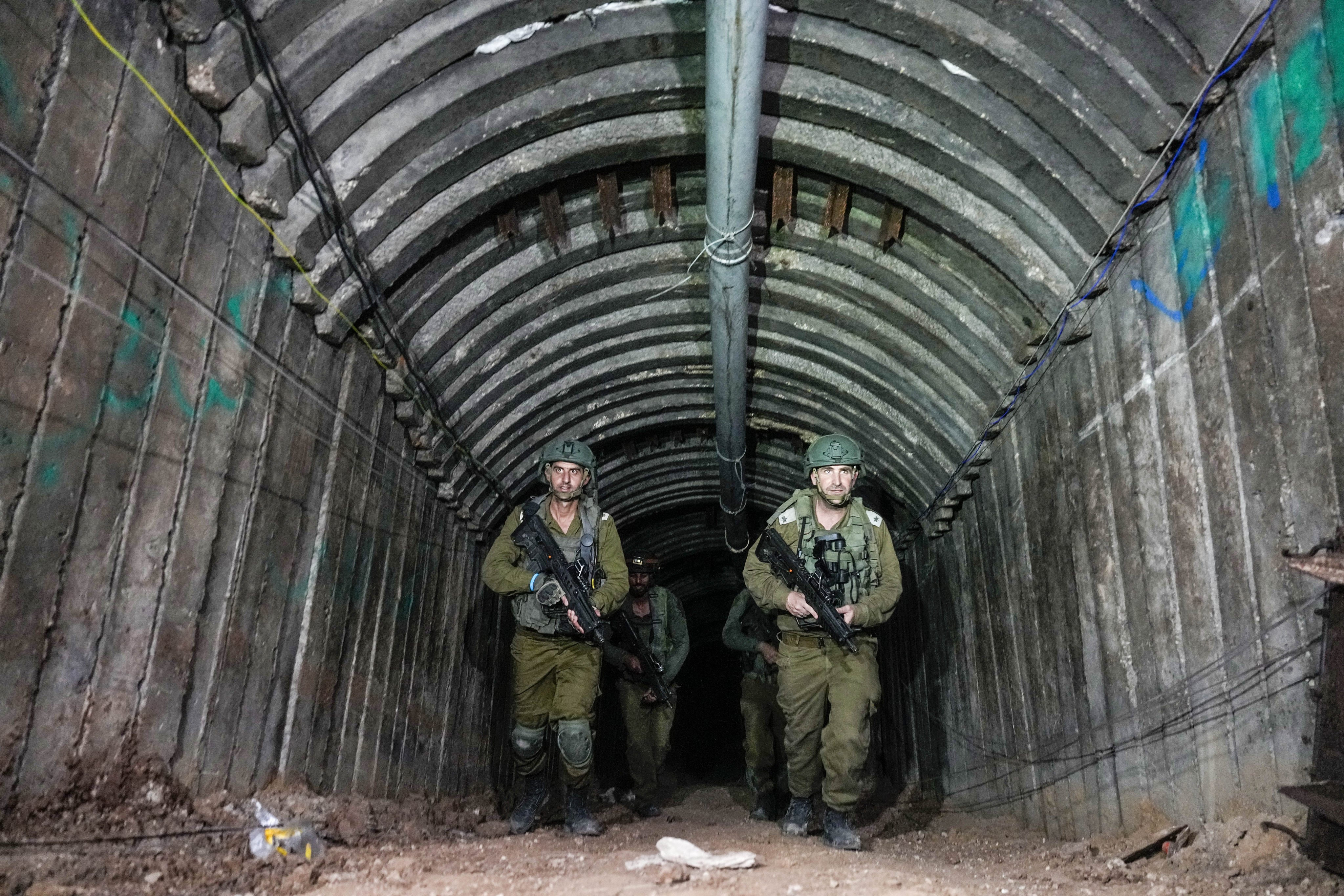 Israeli soldiers the newly discovered Hamas tunnel, near the Erez border crossing in Gaza. Photo: AP