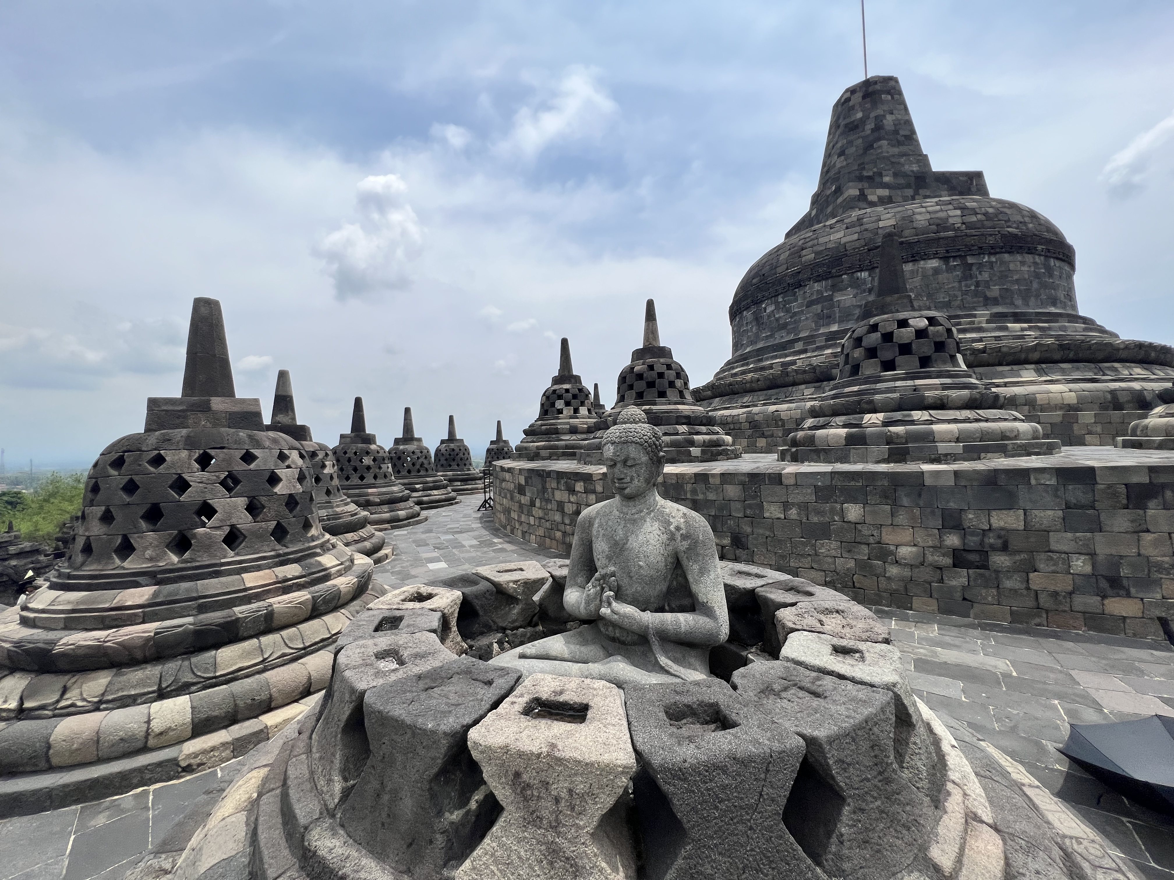 Seventy-two stupas grace three circular platforms at Candi Borobudur, the world’s largest Buddhist temple, located near the central Javanese city of Yogyakarta, Indonesia. Photo: Penny Watson