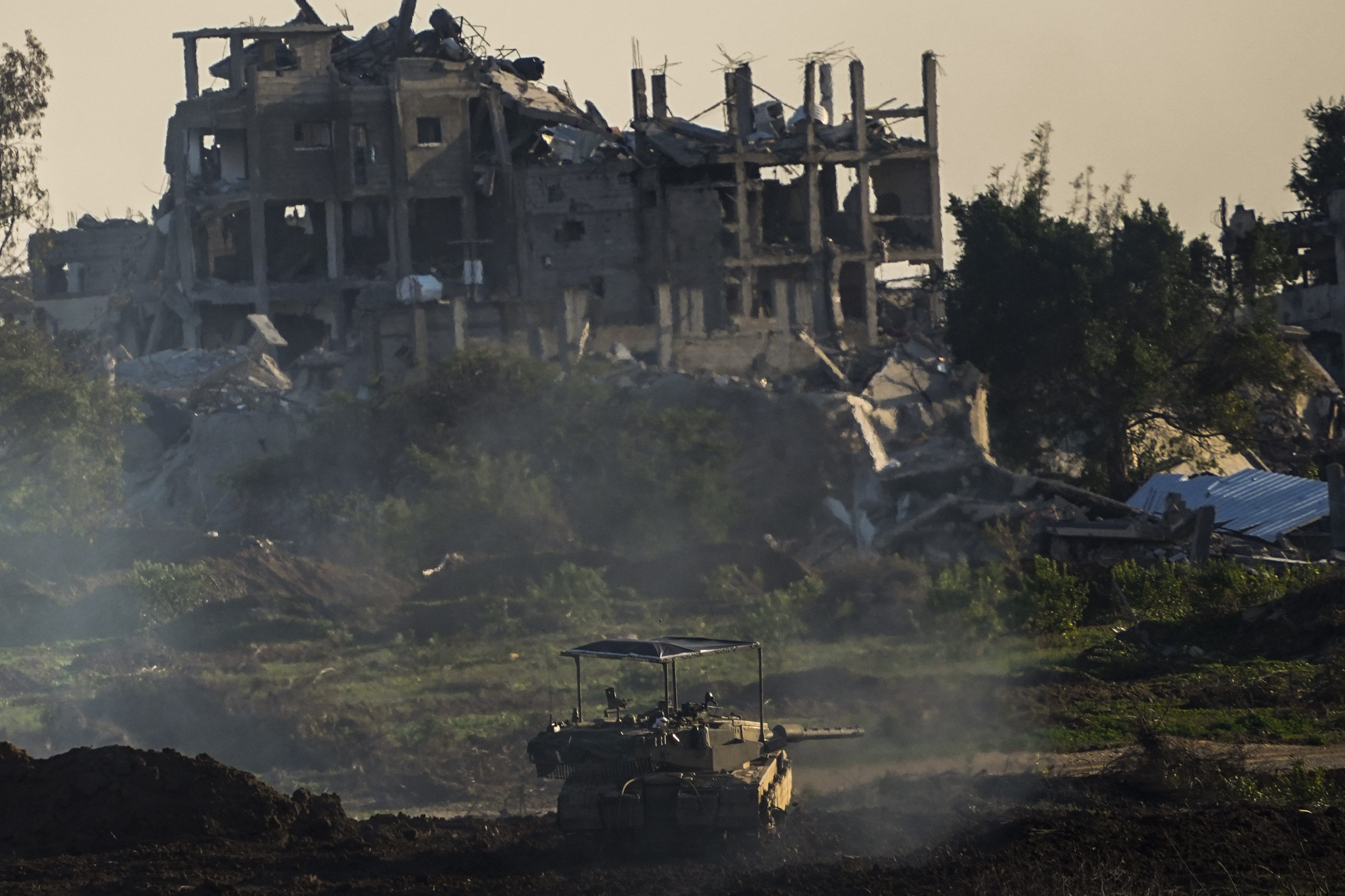 An Israeli tank next to a destroyed building in the northern Gaza Strip on Friday. Photo: AP