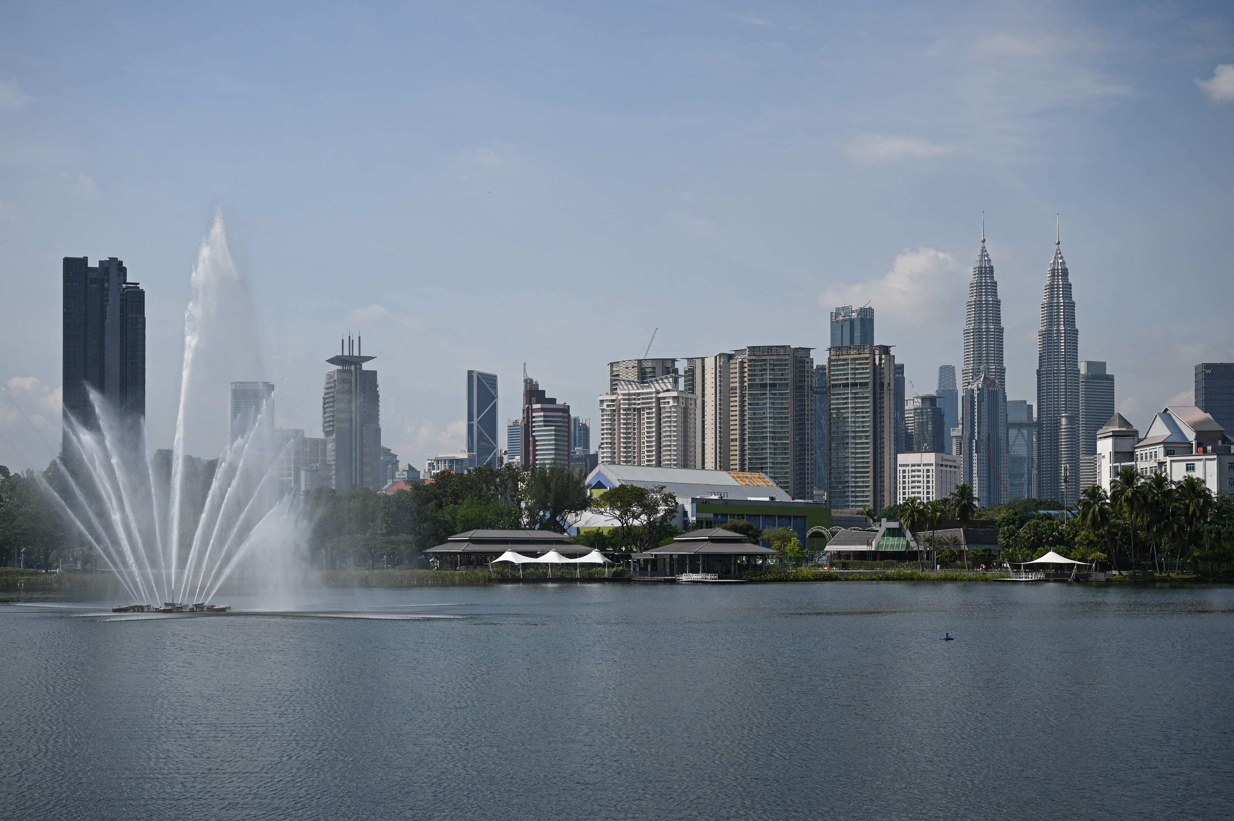 Malaysia’s landmark Petronas Twin Towers (right) and other commercial buildings in Kuala Lumpur. The high-speed rail link aimed to provide a 90-minute direct rail connection between Kuala Lumpur and Singapore. Photo: AFP