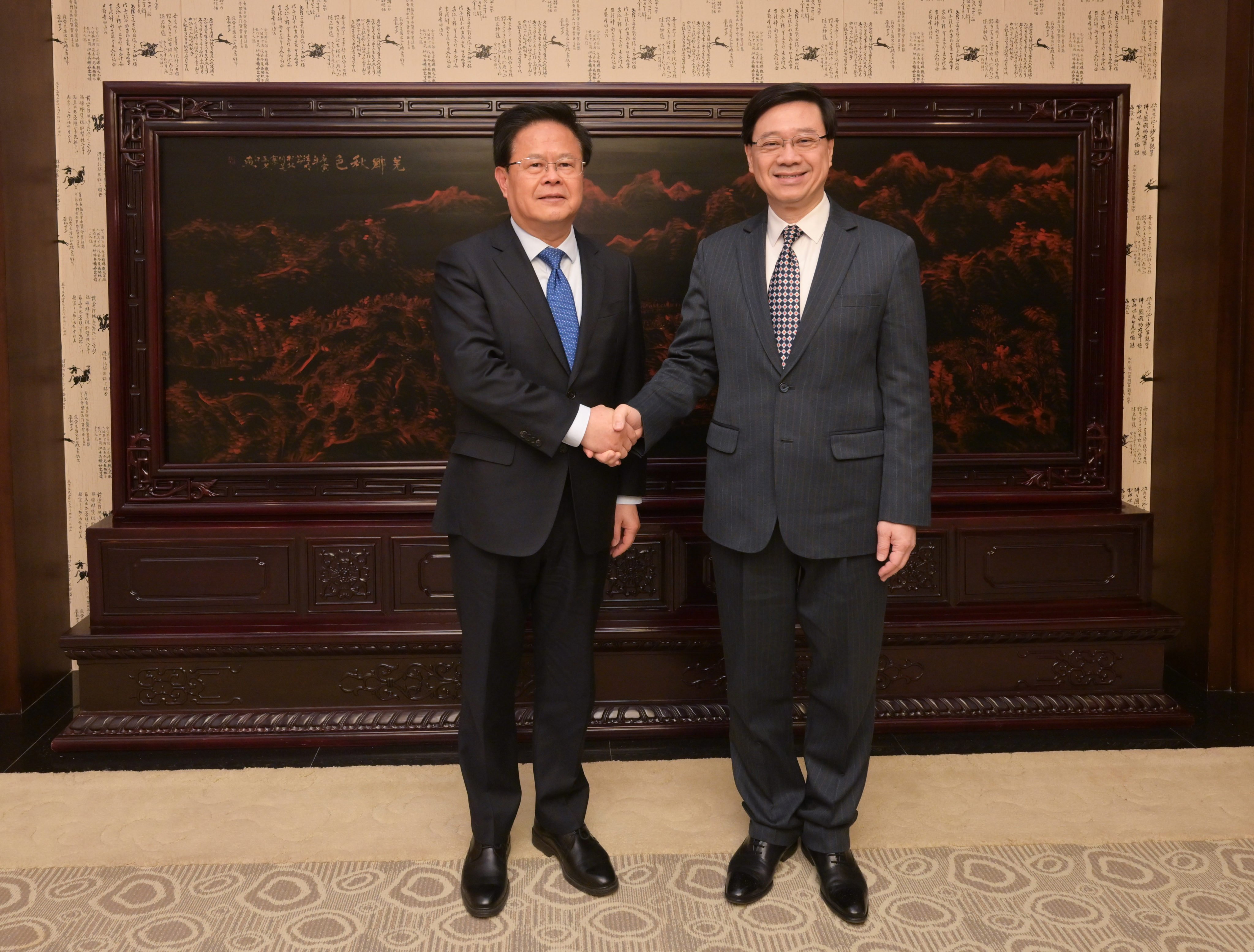 National Development and Reform Commission chairman Zheng Shanjie (left) meets John Lee in Beijing. Photo: Handout