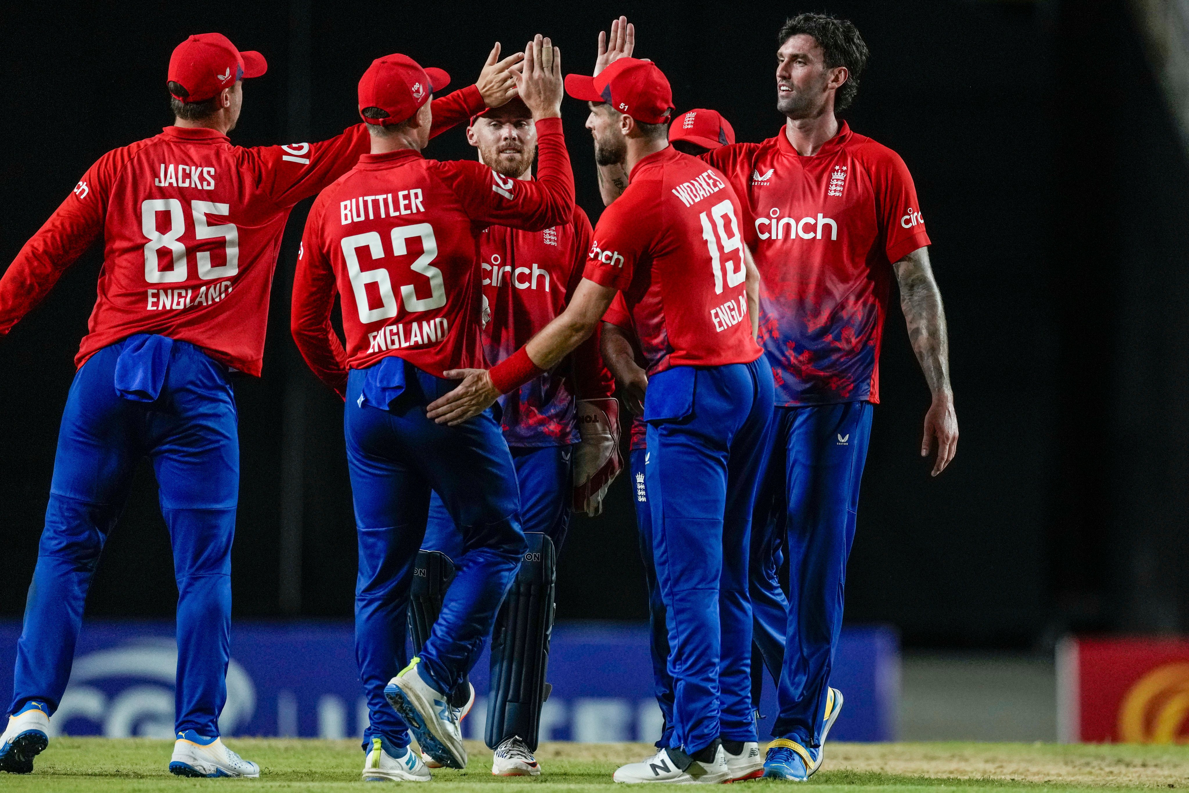 England players celebrate the dismissal of West Indies’ Matthew Forde during the fourth T20 at Brian Lara Academy. Photo: AP