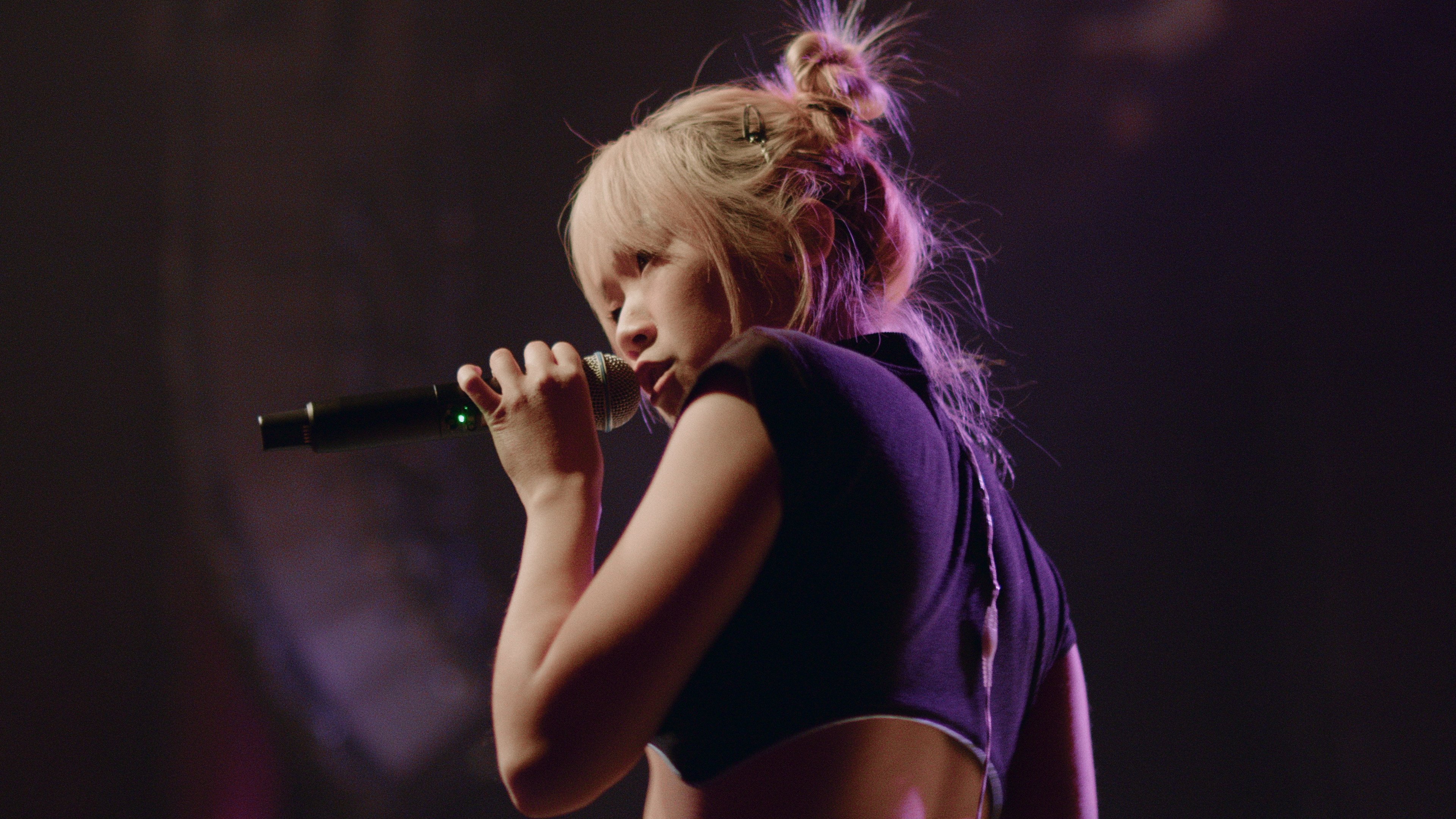 Tiffany Day performing on stage during her self-funded, self-programmed North America tour. The Chinese-American musician opens up about her motivations and finding herself in music, following the release of an award-winning film about the tour. Photo: Henry Thong