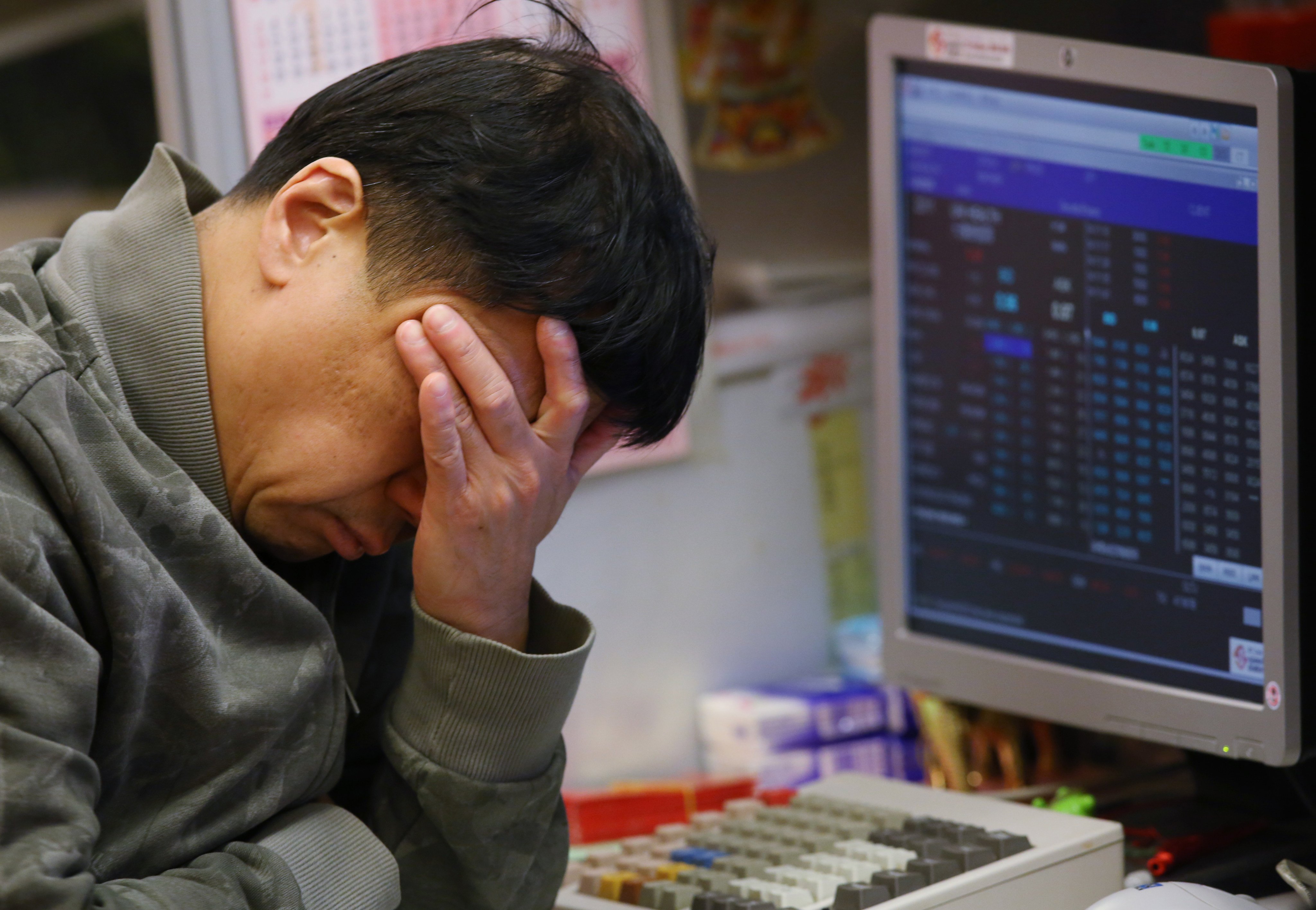 A trader on the floor at the Hong Kong Stock Exchange in 2016. Crises seem to be plaguing the global economy on a regular basis these days, but that is no excuse for policymakers to ignore their responsibilities and hide behind the excuse of “unprecedented events”. Photo: Sam Tsang