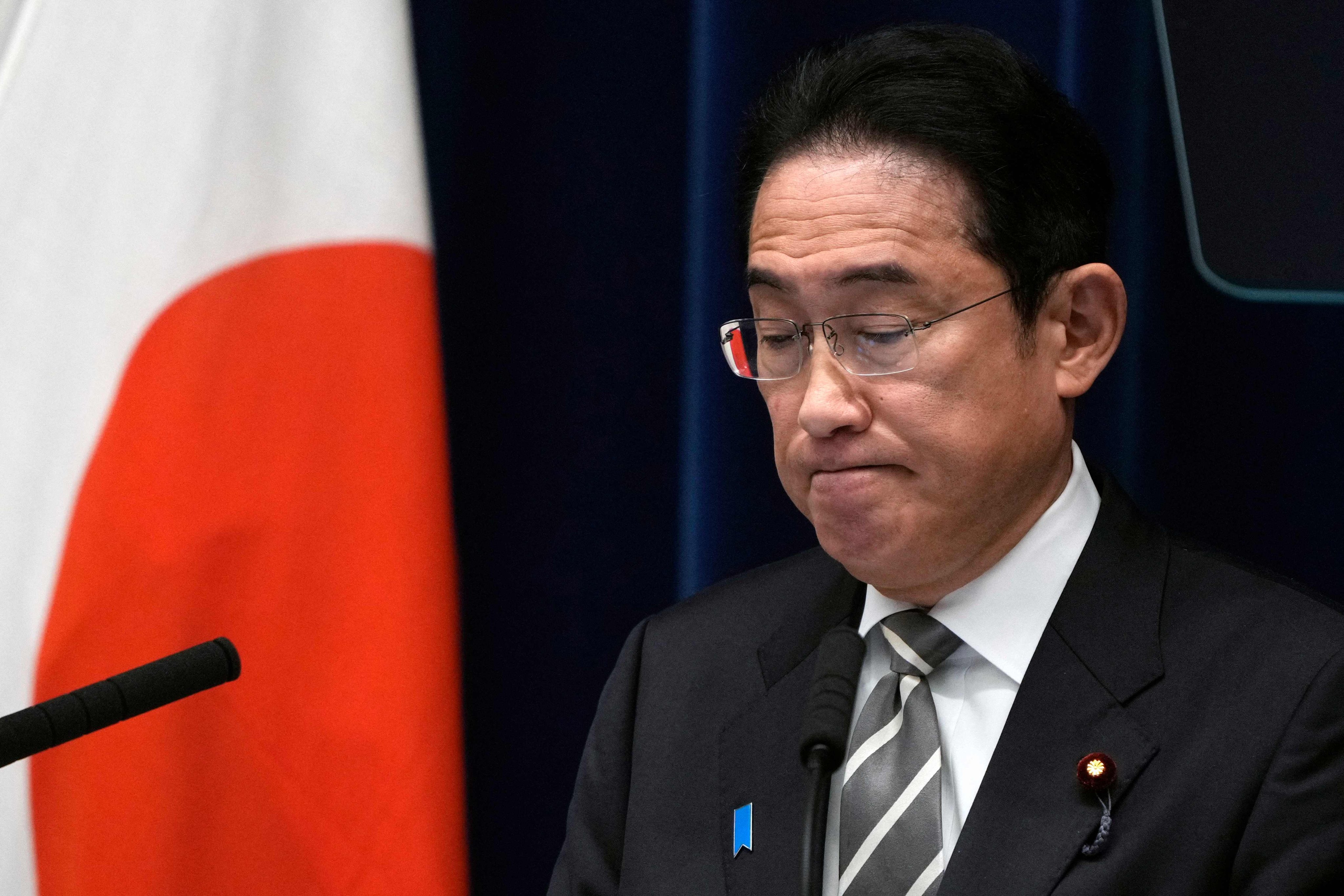 Japan’s Prime Minister Fumio Kishida reacts during a news conference at the Prime Minister’s Office in Tokyo on December 13. Kishida said he would tackle a major funding scandal within his party “like a ball of fire”. Photo: AFP