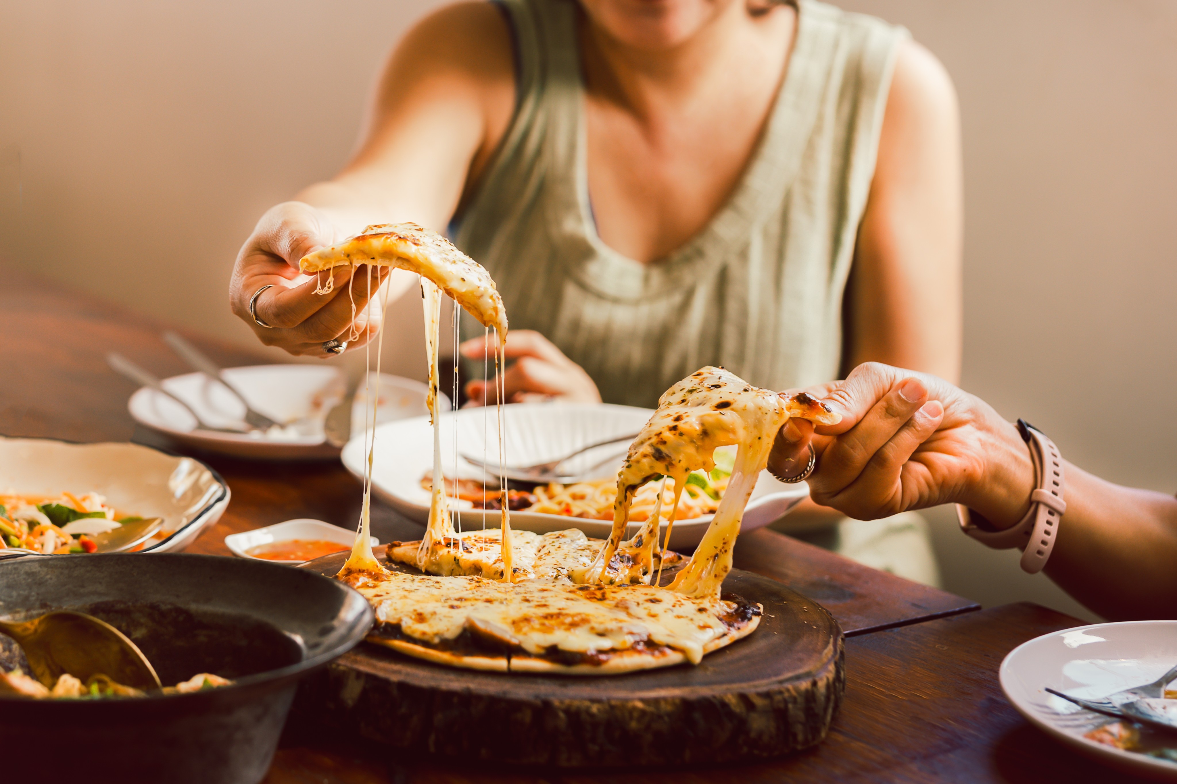 Intuitive eating is a big TikTok and Instagram trend now and is related to a number of physical and mental health benefits. It involves listening to internal hunger cues - and doesn’t mean you have to feel guilty about eating things like pizza. Photo: Shutterstock