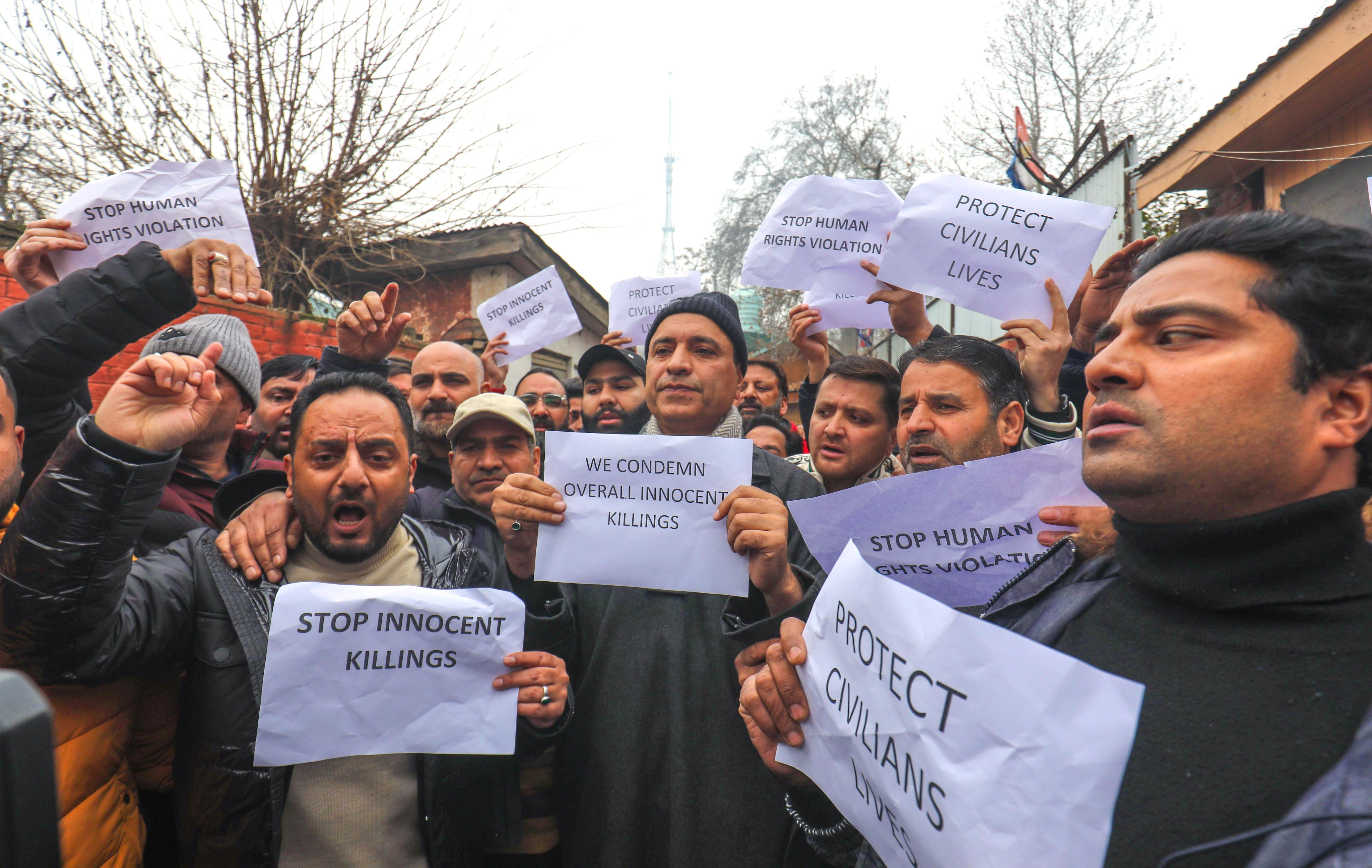 People shout slogans during a protest in Srinagar, in Indian Kashmir, on Saturday, after three civilians were killed while in army custody. Photo: EPA-EFE
