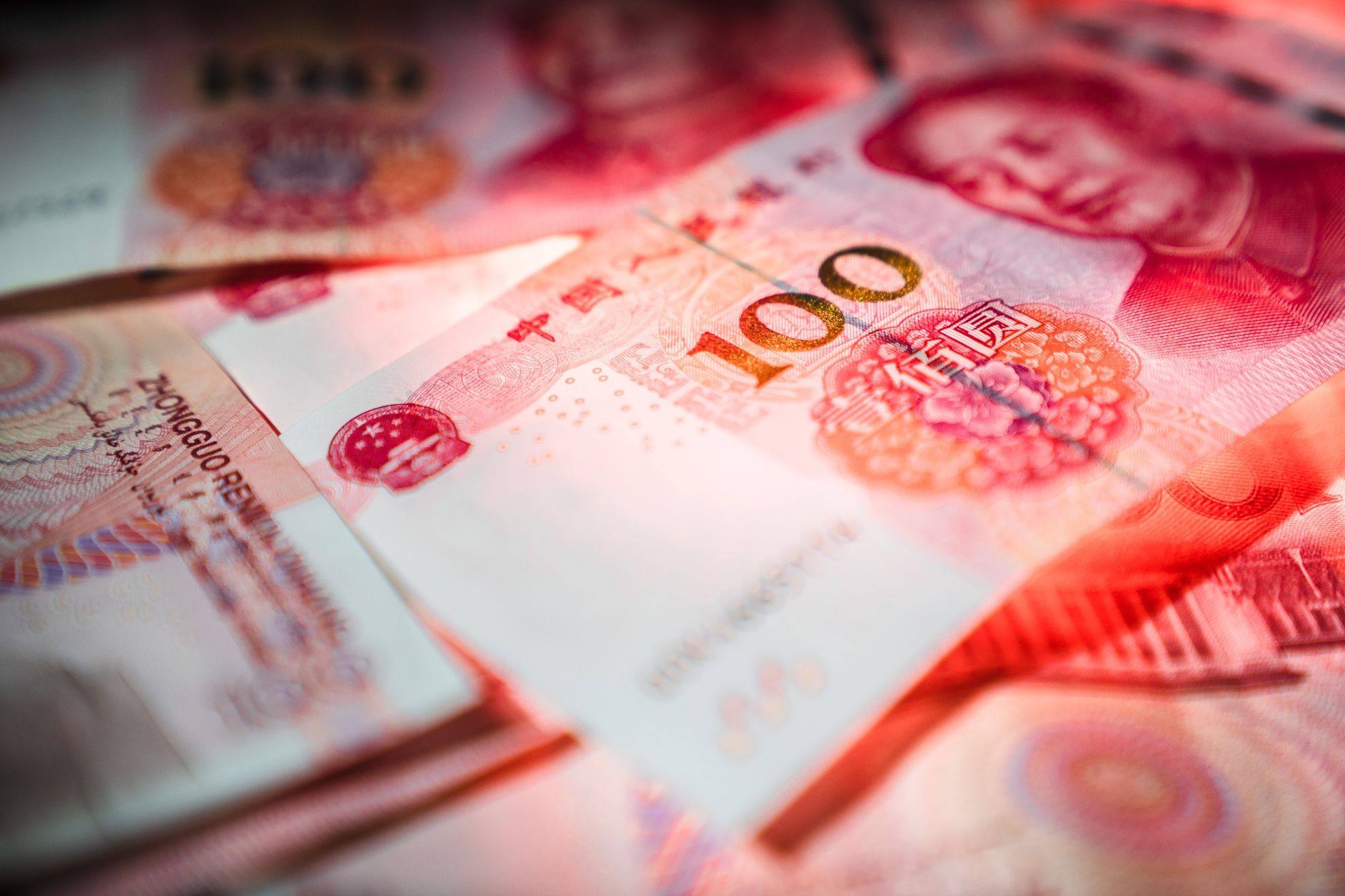 Chinese yuan banknotes. Singapore has placed a 3-month restriction on nonbank money transfers to China, starting January 1. Photo: Bloomberg