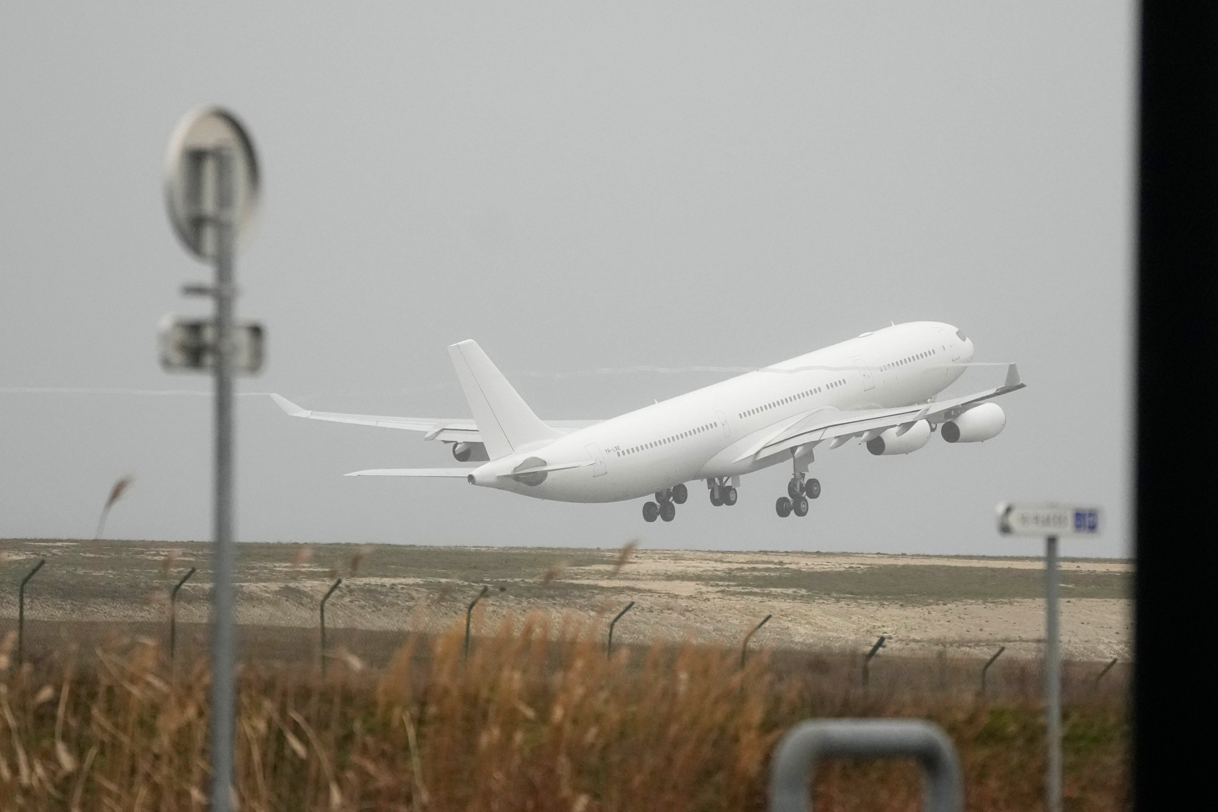 The plane grounded by police at France’s Vatry airport takes off on Monday. Photo: AP