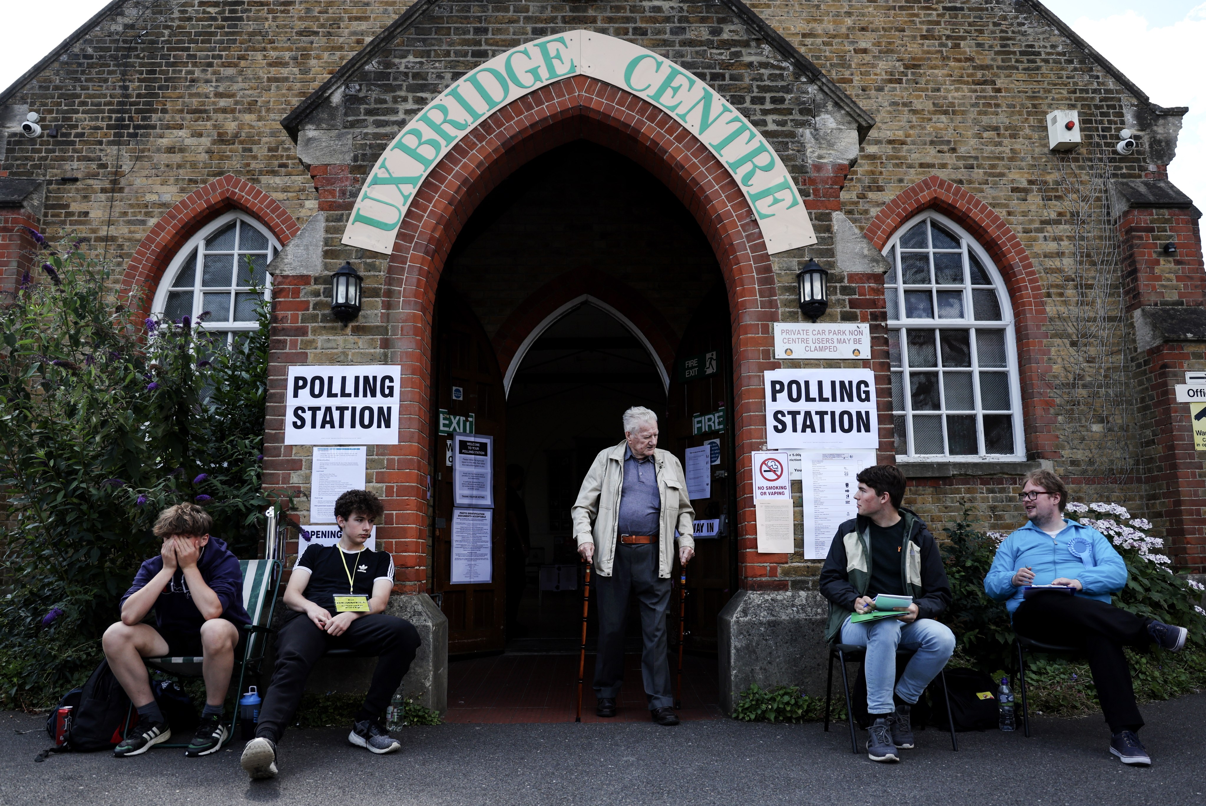 A voter exits a polling station on the day of the by-election for Britain’s parliamentary constituency of Uxbridge in west London on July 20. Photo: EPA-EFE
