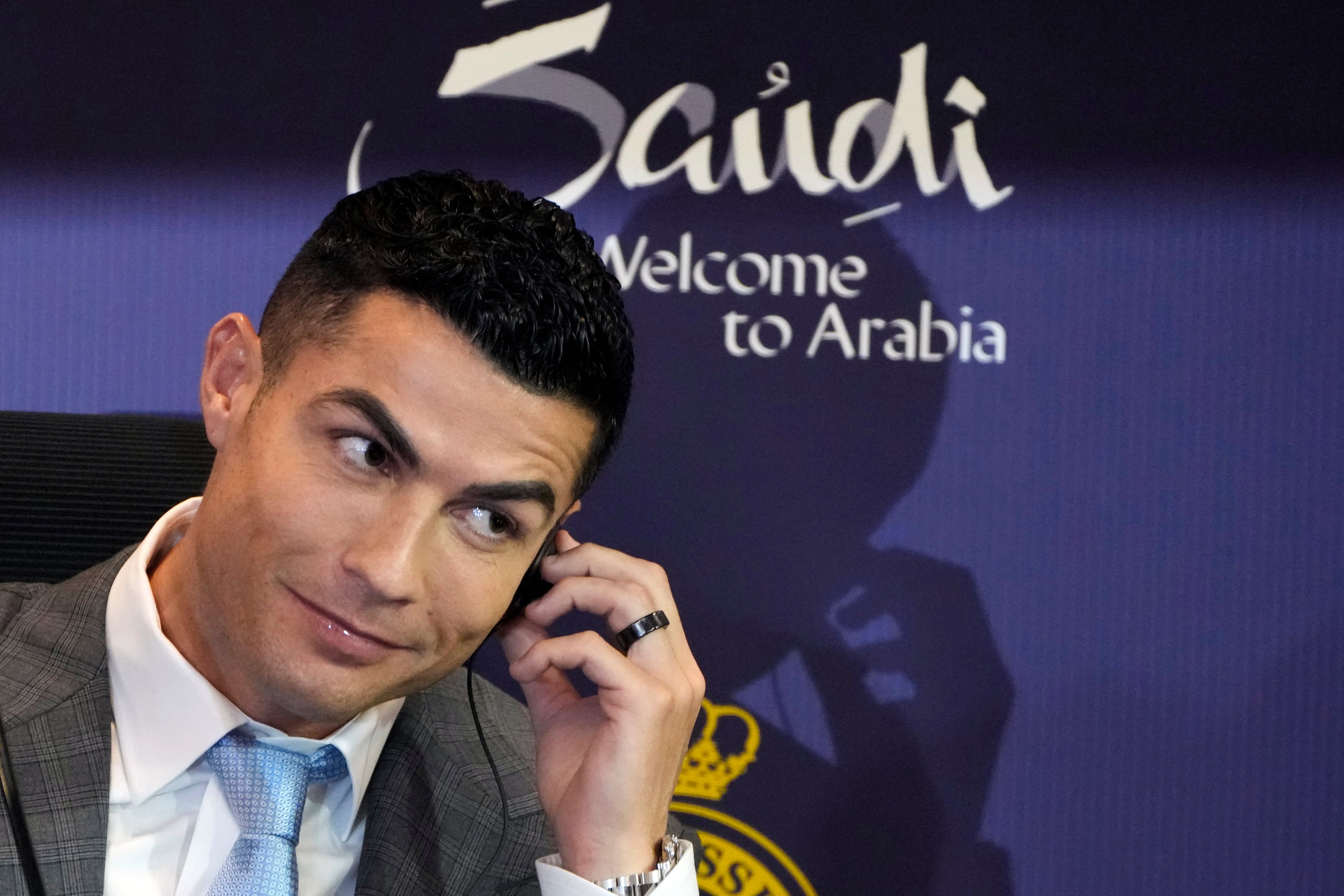 Cristiano Ronaldo listens to a question during a press conference for his official unveiling as a new member of Al Nassr football club in in Riyadh on January 3, 2023. Photo: AP