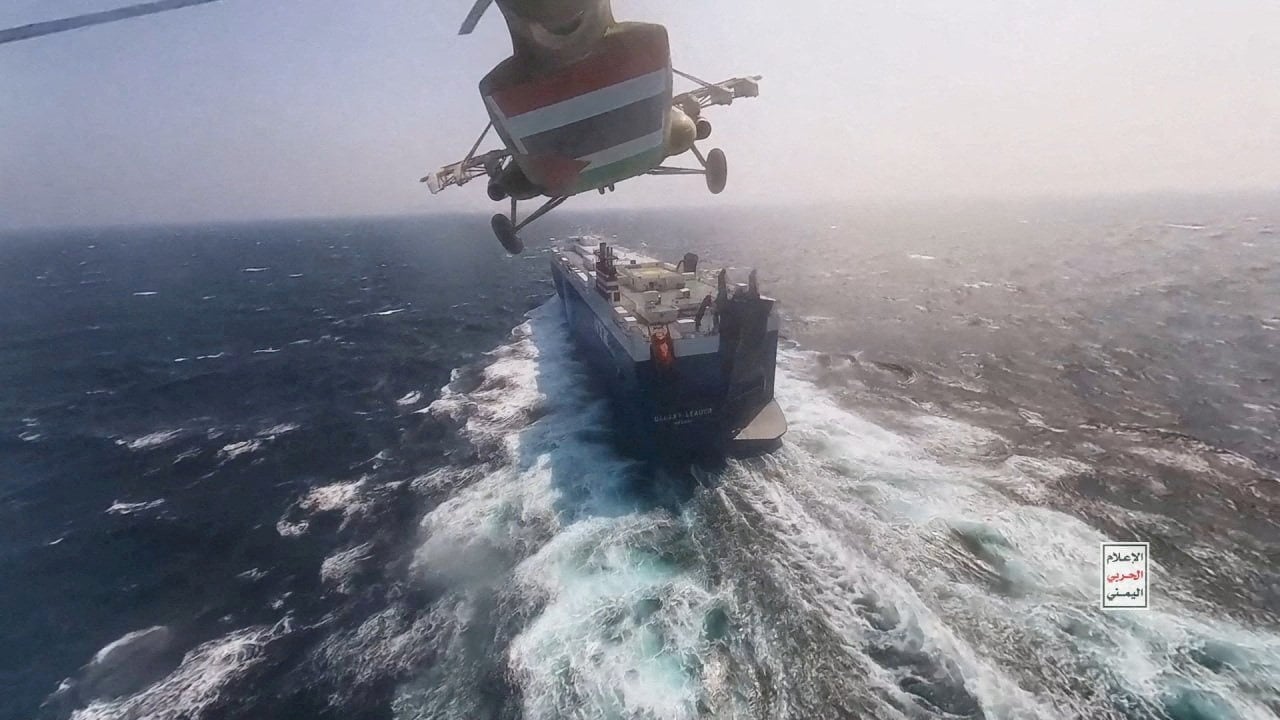 A Houthi military helicopter flies over the Galaxy Leader cargo ship in the Red Sea in this photo released by the group on November 20. Photo: Houthi Military Media/Handout via Reuters